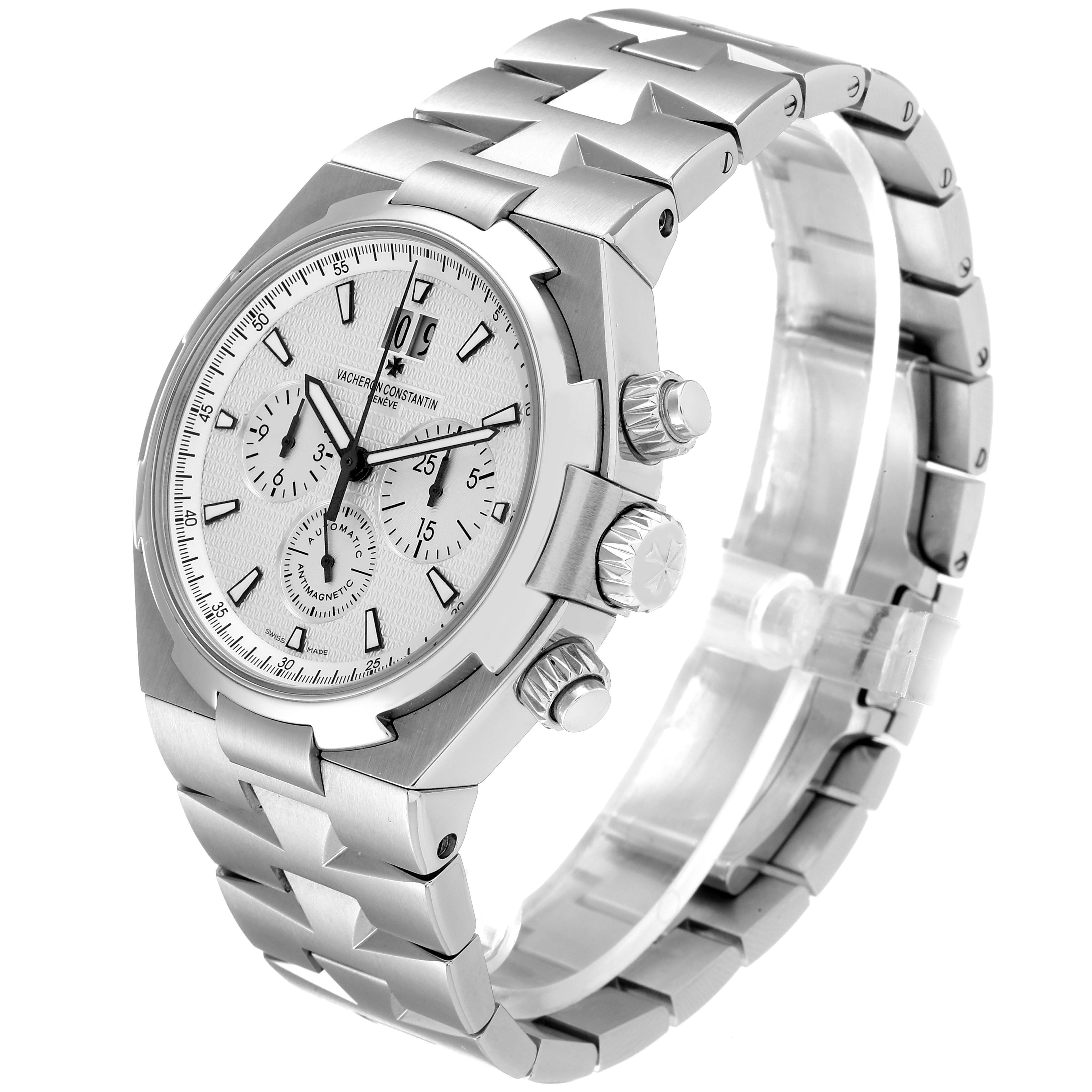 The image shows a side angle of the Vacheron Constantin Overseas 49150 Men
s Stainless Steel Silver Dial 49150 Men
s Stainless Steel Silver Dial model, highlighting the watch
s face, crown, pushers, and stainless steel bracelet.