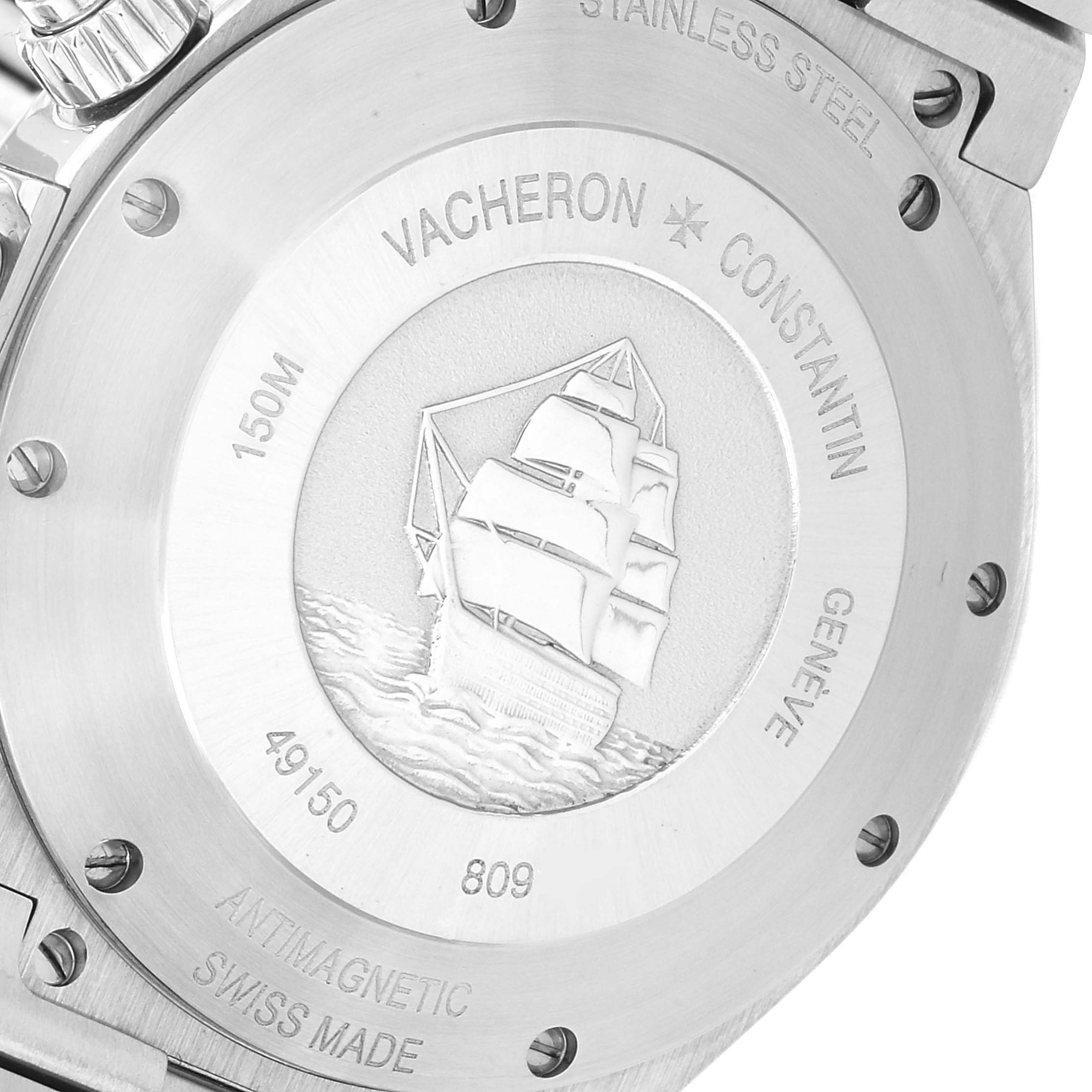 The image shows the case back of a Vacheron Constantin Overseas 49150 Men
s Stainless Steel Silver Dial 49150 Men
s Stainless Steel Silver Dial model watch, featuring engravings and an embossed ship design.