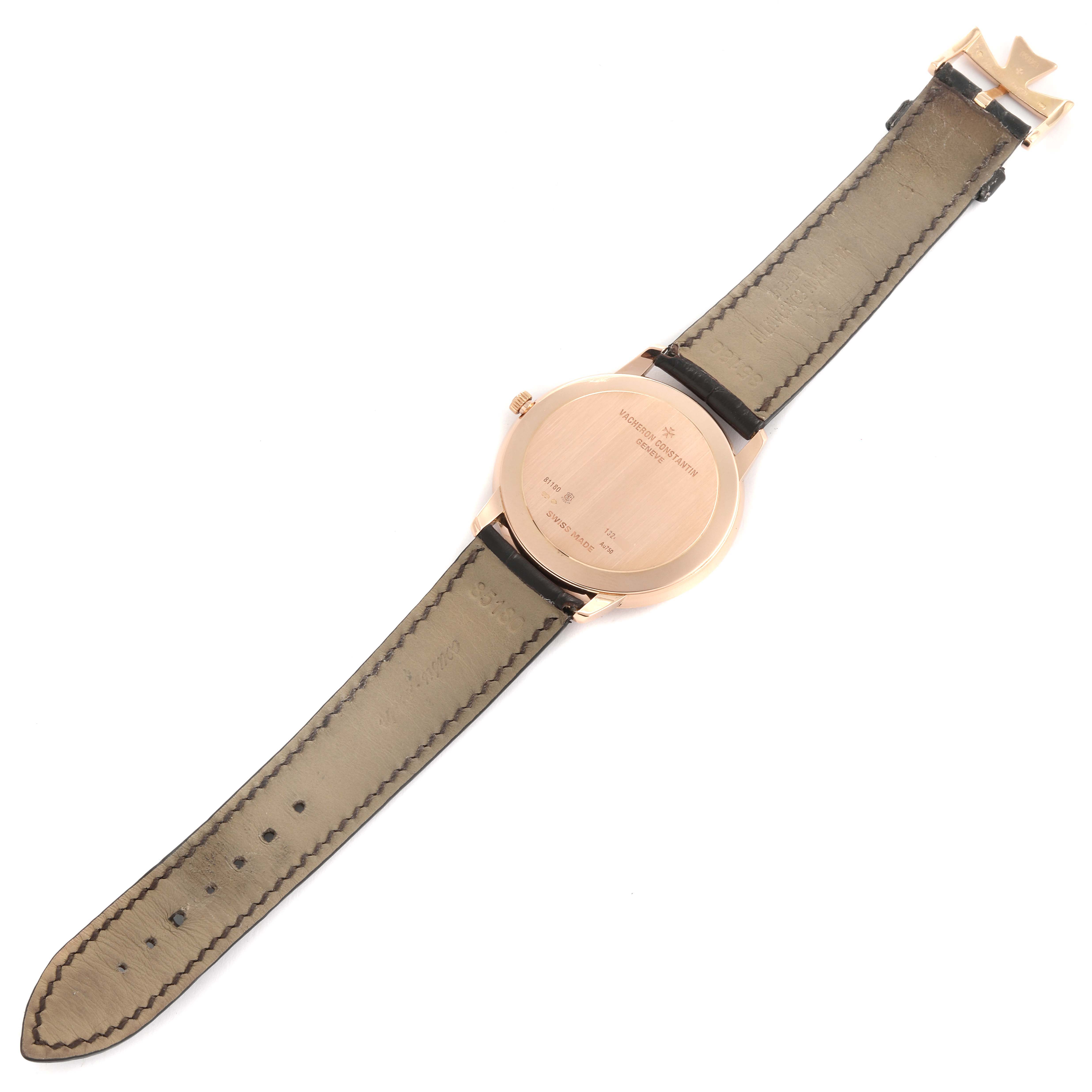 The image shows the back case and strap of a Patrimony watch by Vacheron Constantin laid flat.