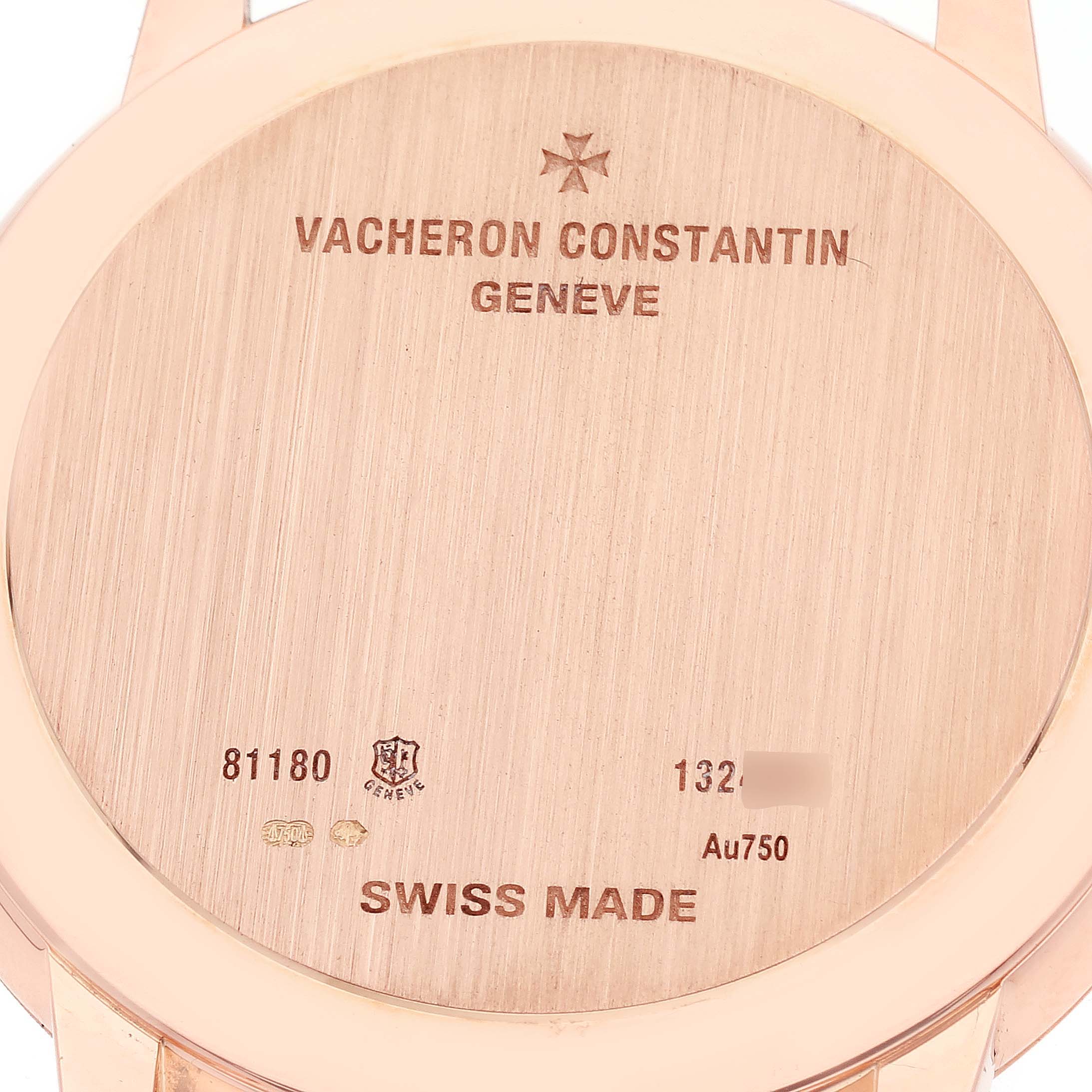 The image shows the case back of the Patrimony model by Vacheron Constantin.