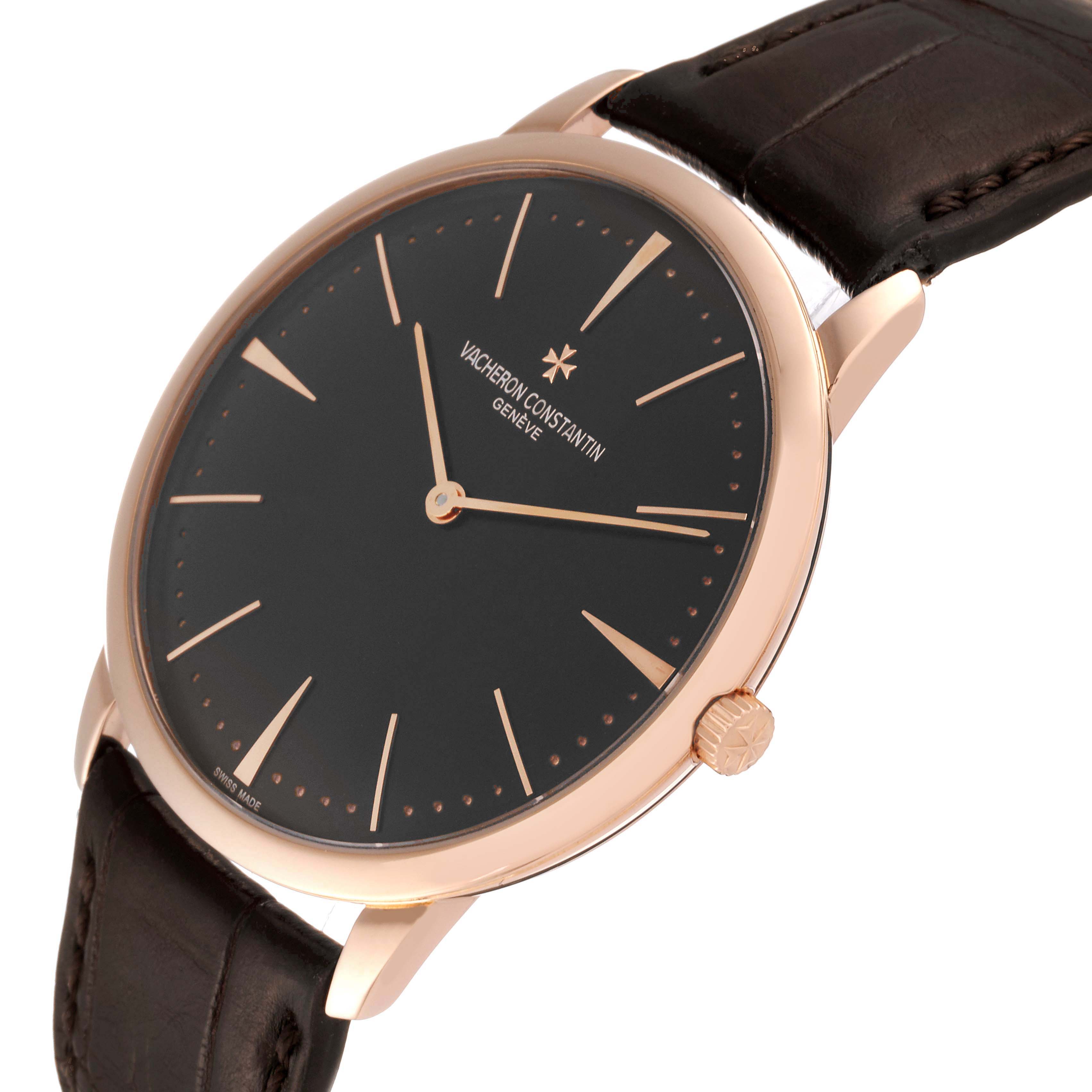 The Vacheron Constantin Patrimony 81180/000R Men's Rose Gold Brown Dial watch is shown at an oblique angle, highlighting the watch face, crown, and leather strap.
