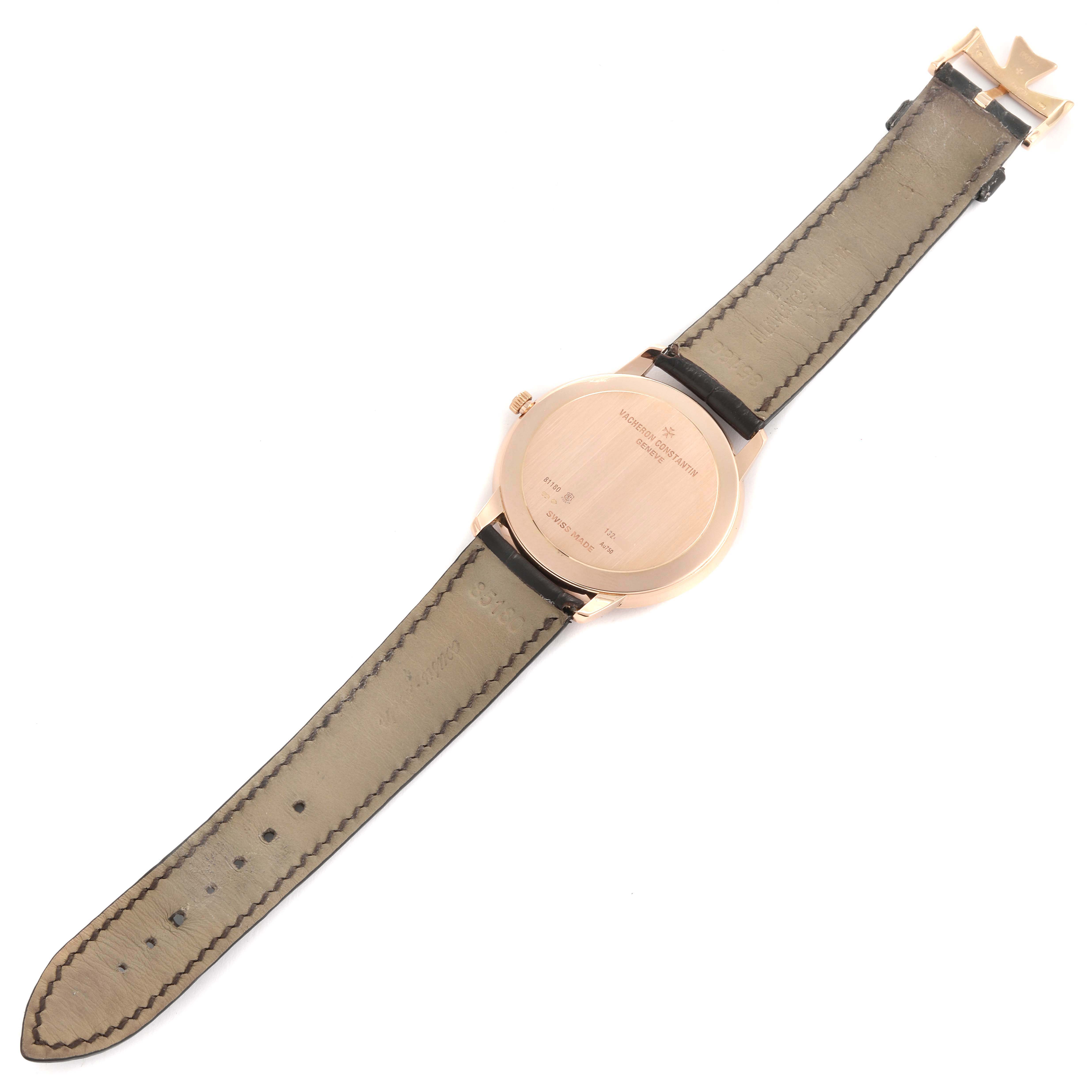 The image shows the back of a Vacheron Constantin Patrimony 81180/000R-9283 Men's Rose Gold Brown Dial watch, highlighting the case back and leather strap.