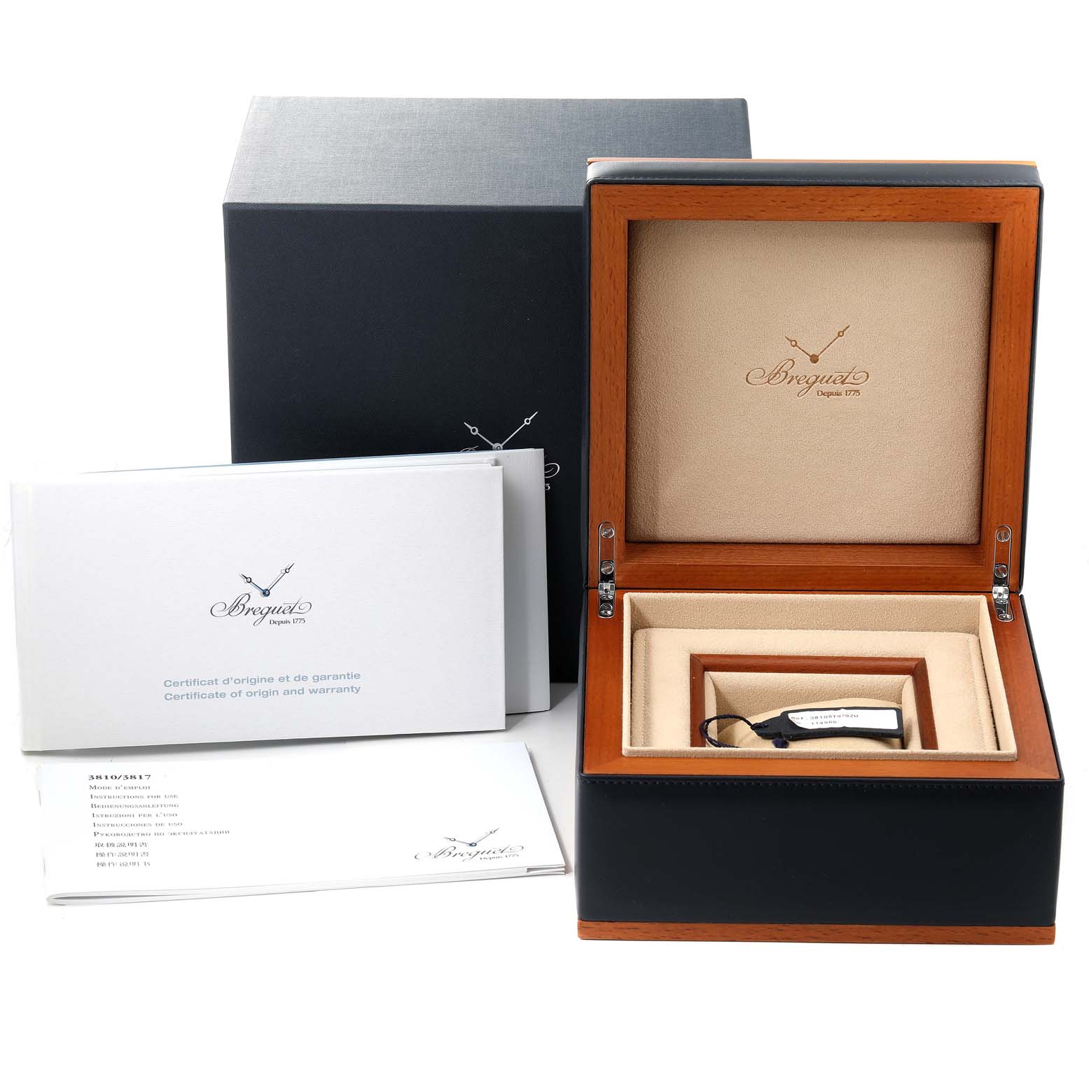 The image shows the packaging and warranty documents for a Breguet Type XX - XXI - XXII 3810ST/92/9ZU Men's Stainless Steel Silver Dial 3810ST/92/9ZU Men's Stainless Steel Silver Dial watch, including a watch box and manuals.