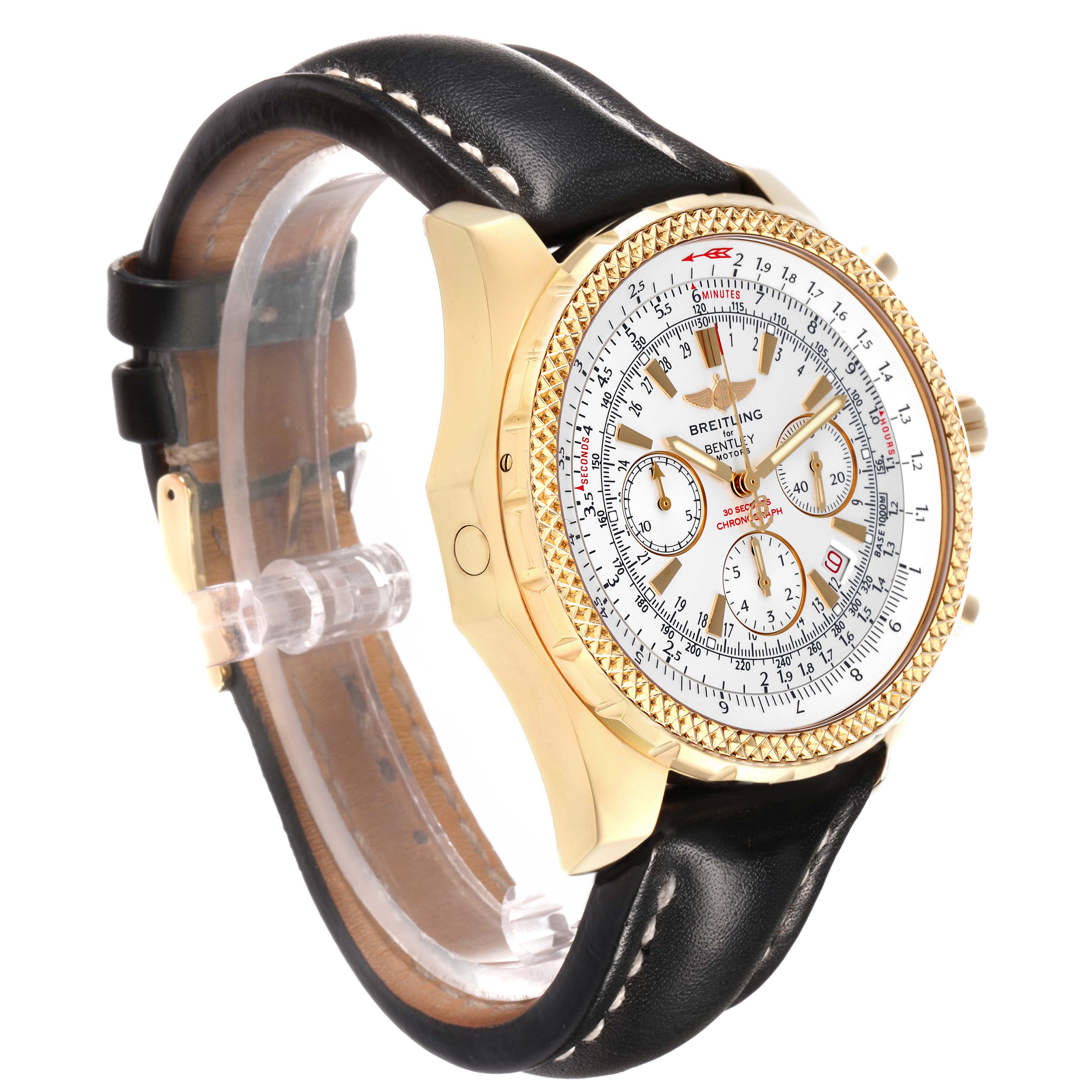 The Breitling Bentley K25362 Men's Yellow Gold White Dial watch is shown at a three-quarter angle, displaying its gold case, bezel, dial, and black leather strap.