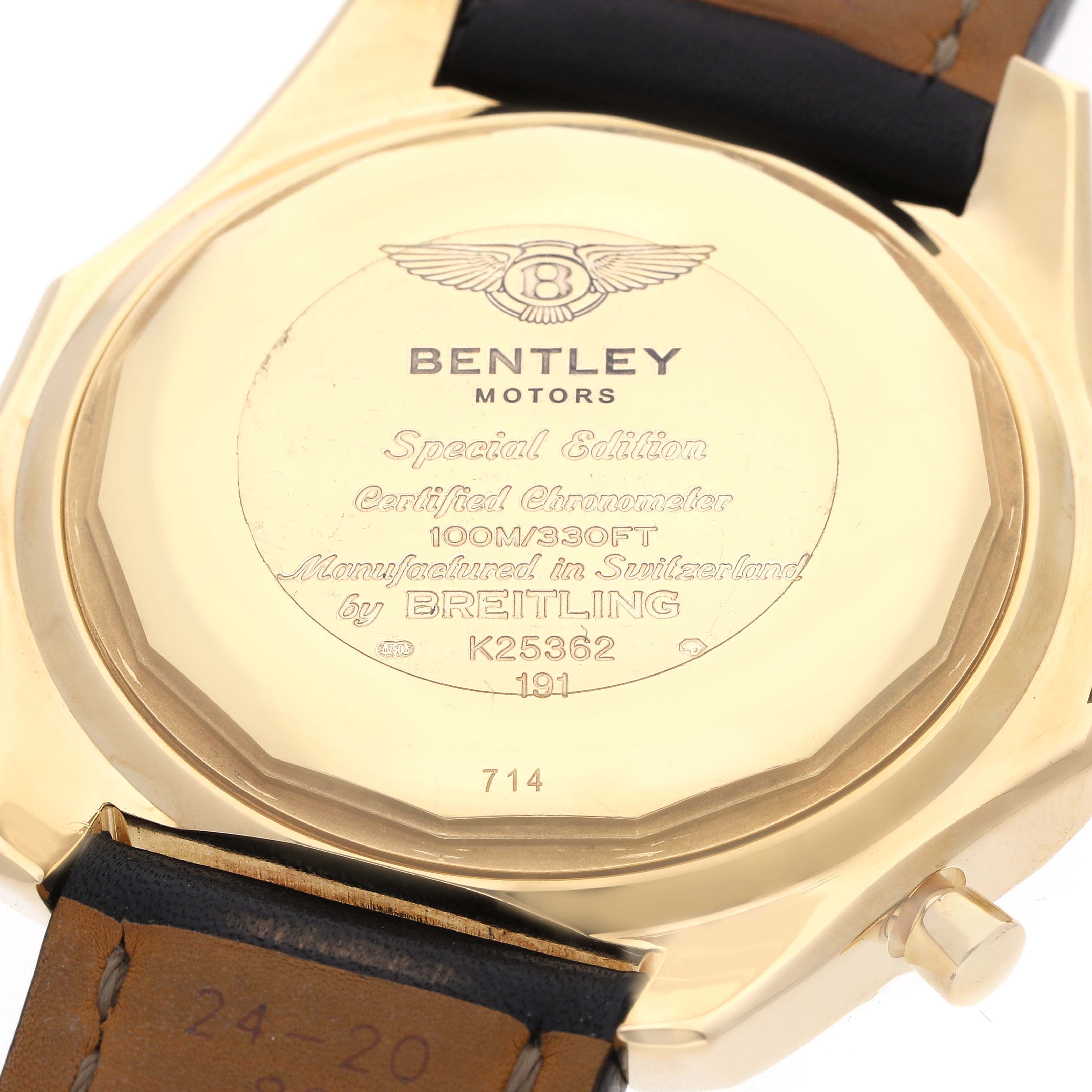 The image shows the case back of a Bentley model by Breitling, highlighting the engraving and leather strap attachment.
