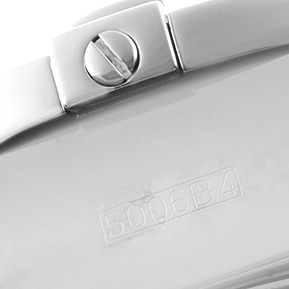 This image shows a close-up of the clasp and part of the metal strap of the Breitling Chronomat A13356 Men
s Stainless Steel Black Dial A13356 Men
s Stainless Steel Black Dial watch, featuring a screw and model number 5006B4.