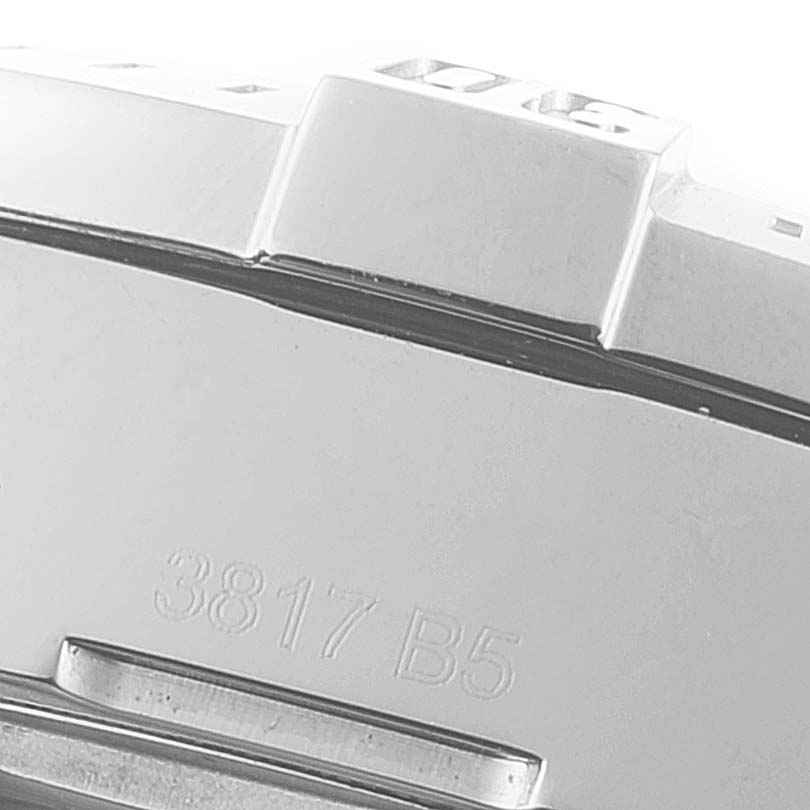 This close-up image shows the side view of the bezel and part of the case back of a Colt model by Breitling.