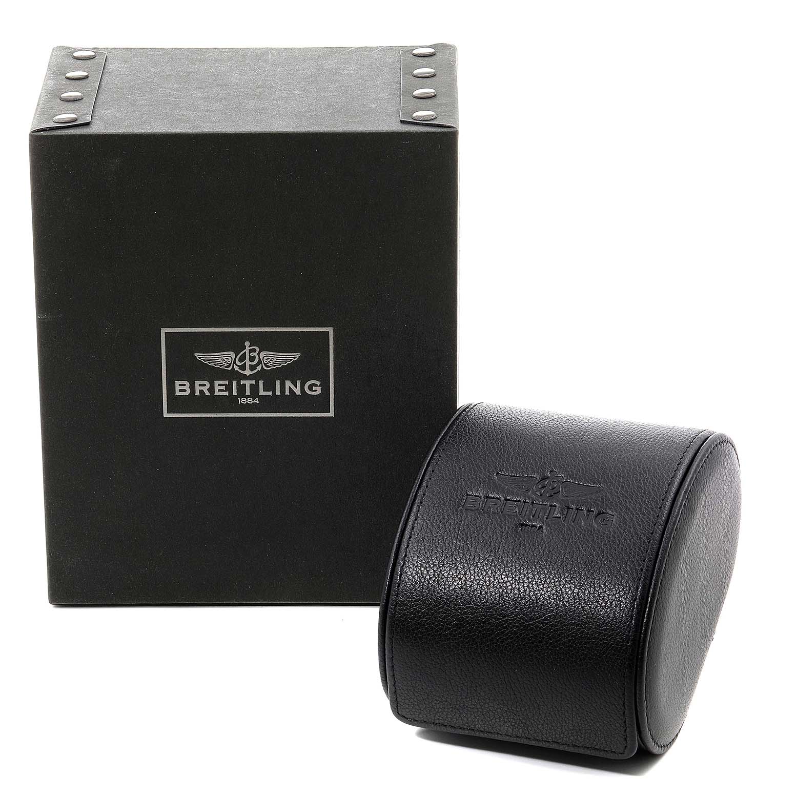 The image shows the box and a leather travel case for the Breitling Navitimer A23322 Men's Stainless Steel Black Dial A23322 Men's Stainless Steel Black Dial watch, both featuring the brand's logo.