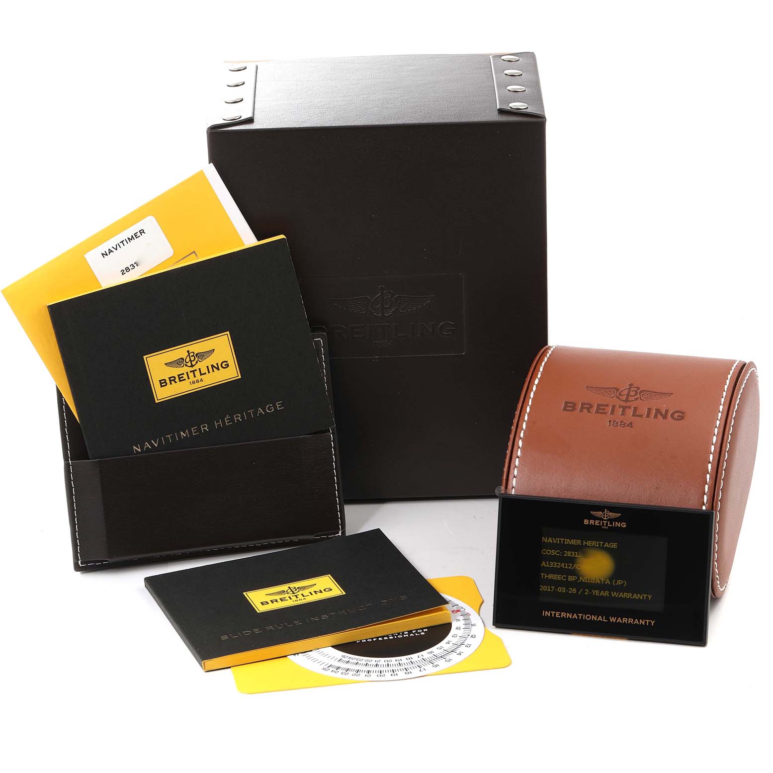 The image shows the packaging, warranty card, manuals, and watch case for the Breitling Navitimer A13324 Men
s Stainless Steel Blue Dial A13324 Men
s Stainless Steel Blue Dial model.