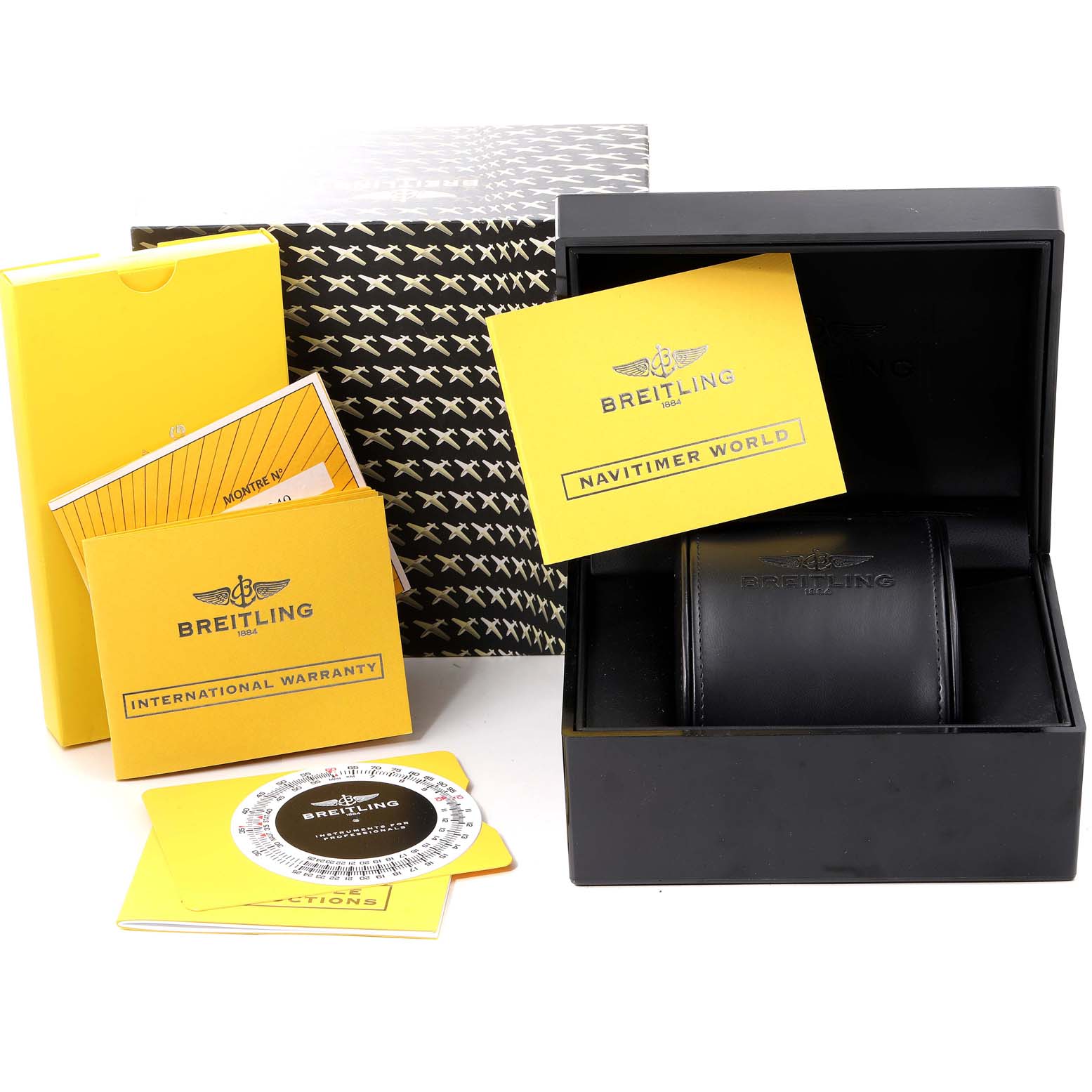 The image shows the packaging and accessories for a Breitling Navitimer A24322 Men
s Stainless Steel Blue Dial A24322 Men
s Stainless Steel Blue Dial model, including a box, warranty card, and instruction booklets.