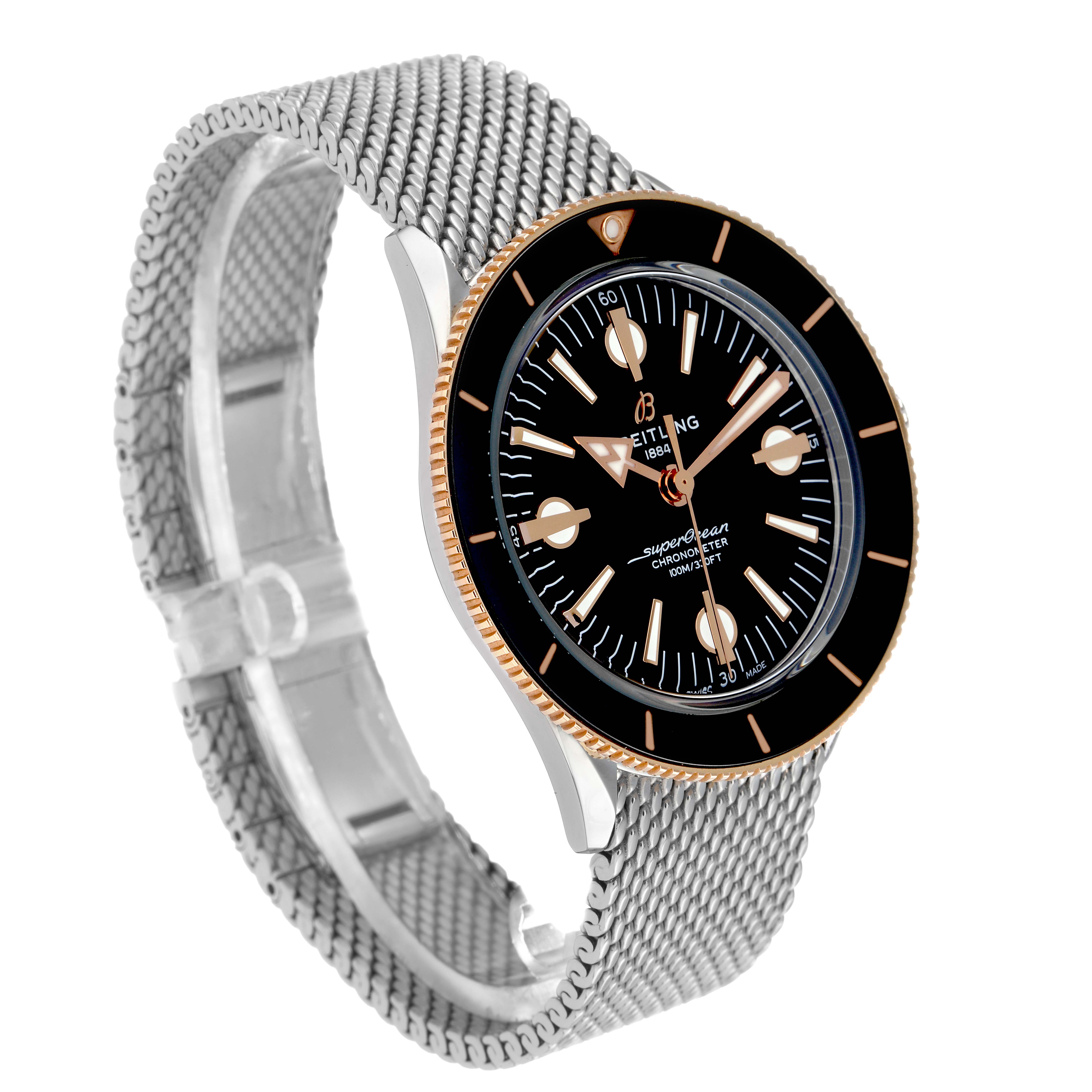 The Breitling Superocean U10370121B1A1 Men's Stainless Steel Black Dial watch is shown at an angled side view highlighting the black dial, gold accents, and mesh strap.