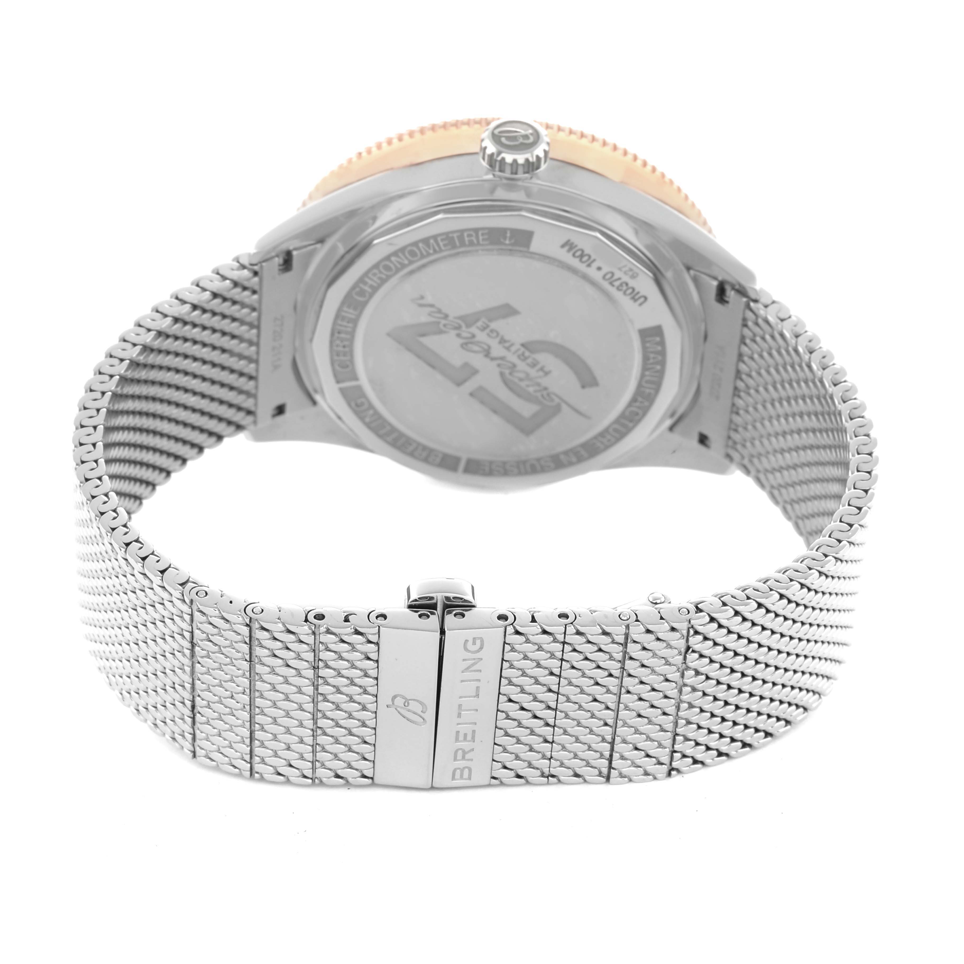 The image shows a rear angle of the Breitling Superocean U10370121B1A1 Men's Stainless Steel Black Dial watch, highlighting its case back and metal mesh strap.