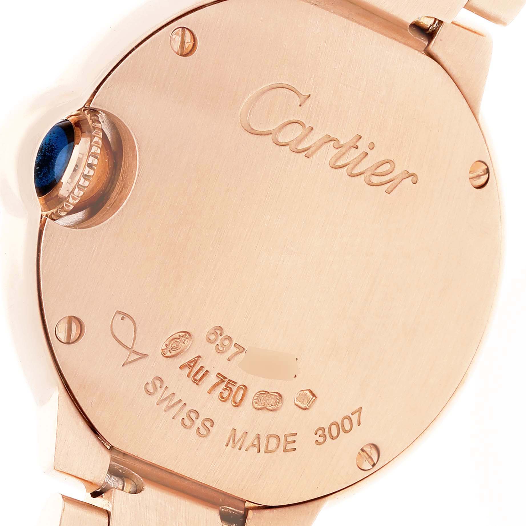 The image shows the back case and crown of the Cartier Ballon Bleu WE902025 Women's Rose Gold Silver Dial WE902025 Women's Rose Gold Silver Dial watch.