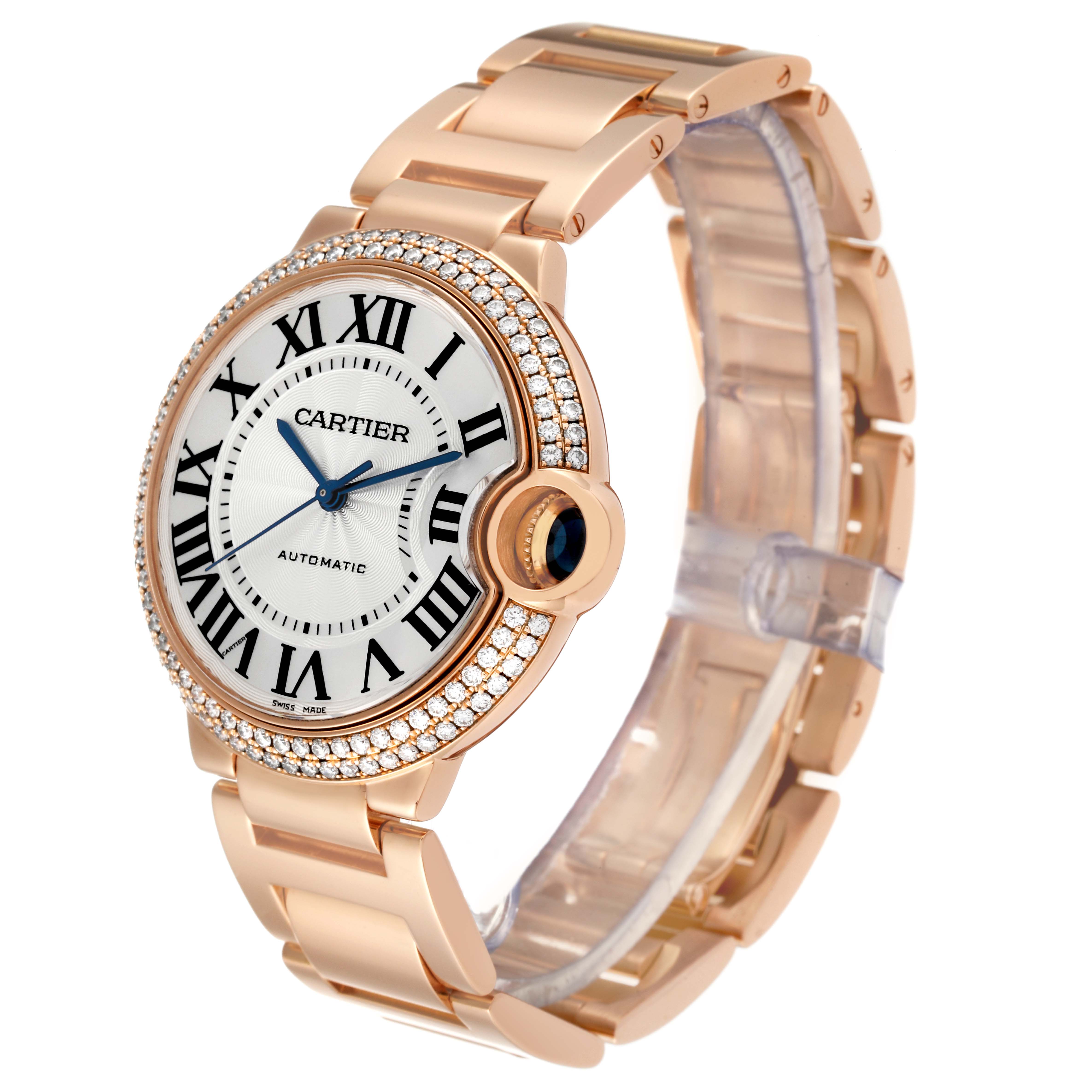 The image shows a Cartier Ballon Bleu WE9005Z3 Men's Rose Gold Silver Dial WE9005Z3 Men's Rose Gold Silver Dial watch at an angle highlighting its face, bracelet, and jeweled bezel.