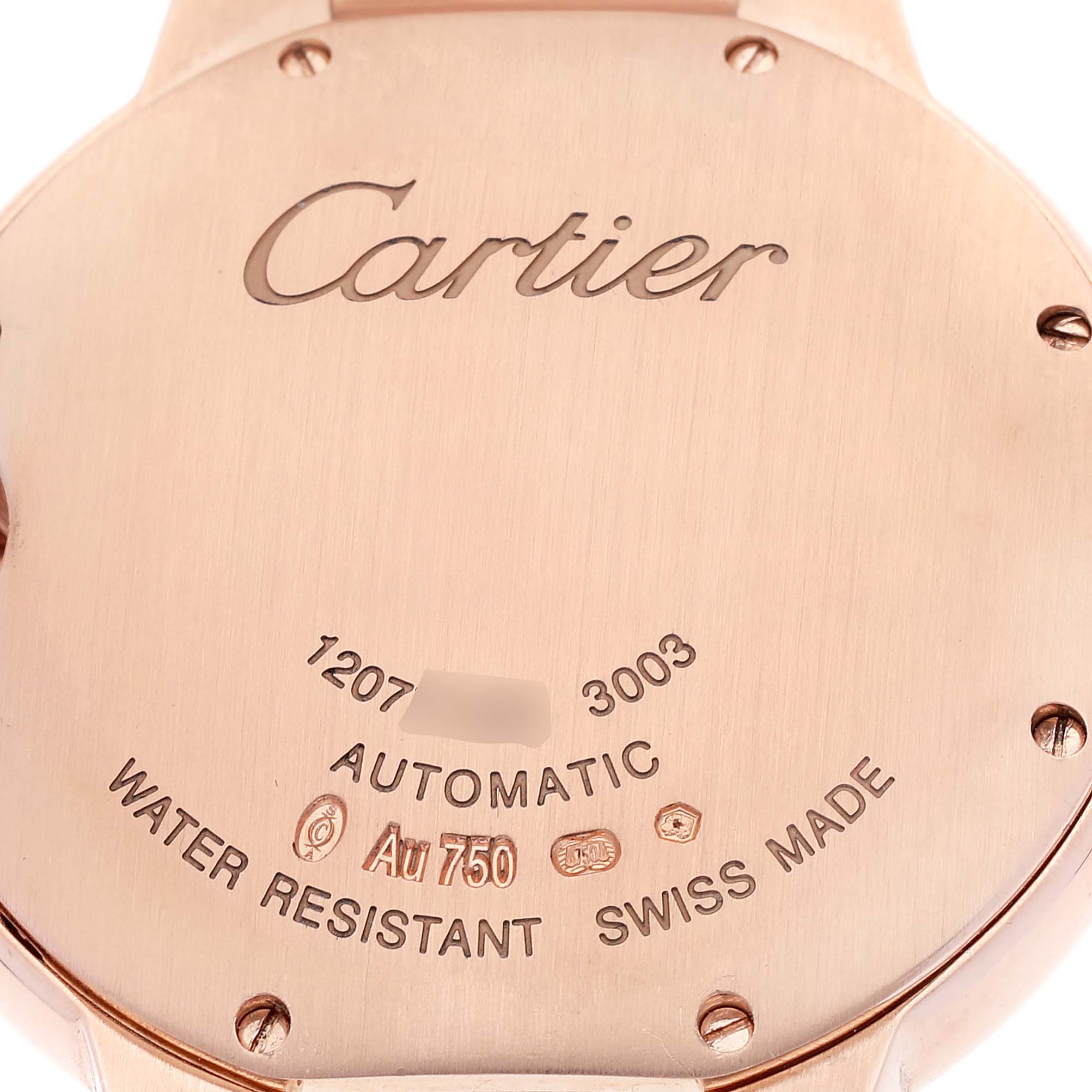 This image shows the back case of the Cartier Ballon Bleu WE9005Z3 Men's Rose Gold Silver Dial WE9005Z3 Men's Rose Gold Silver Dial watch, highlighting engravings and markings of authenticity.
