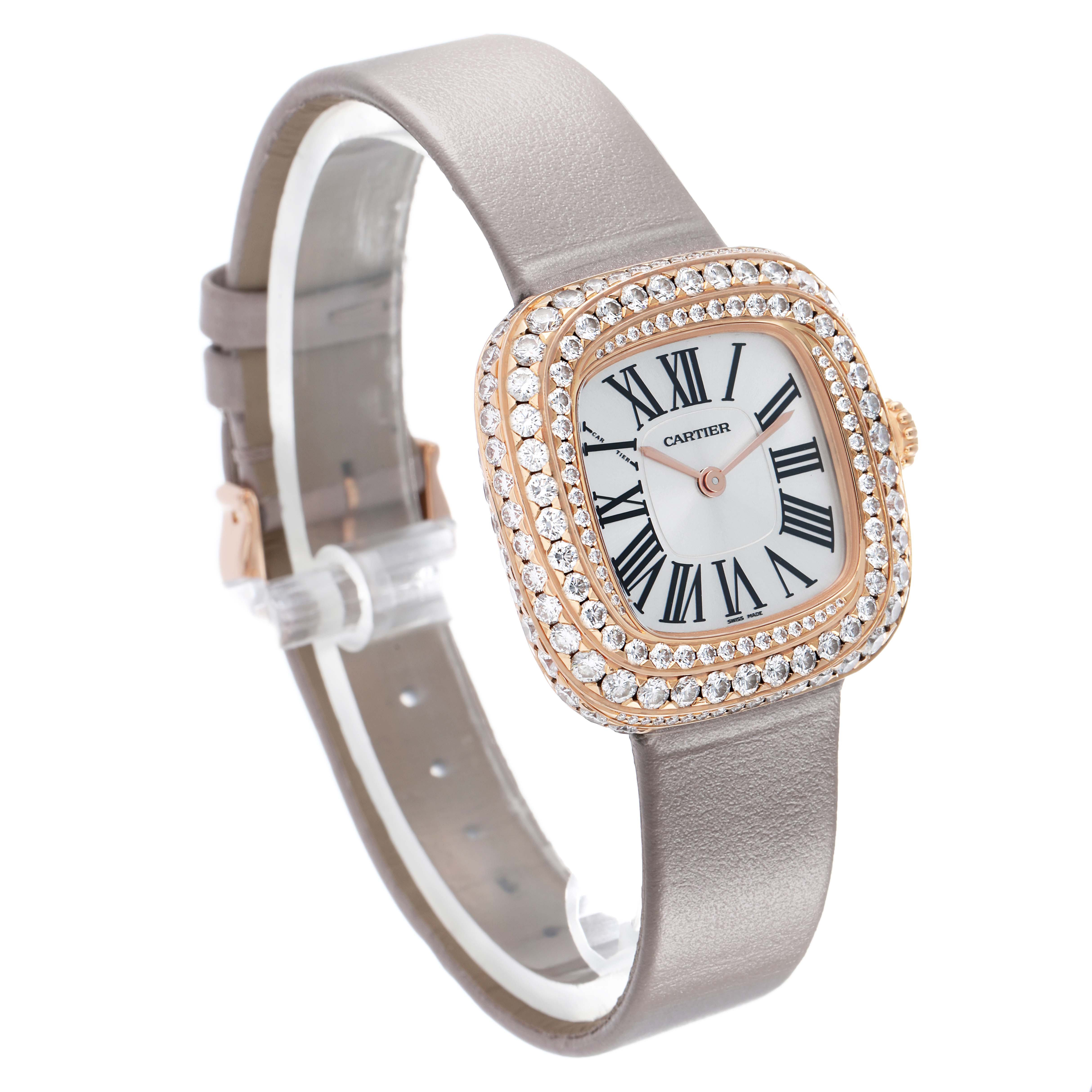 The Cartier Coussin WJCS0005 Women
s Rose Gold Silver Dial watch is shown at an angle highlighting its diamond-studded bezel, Roman numeral face, and leather strap.