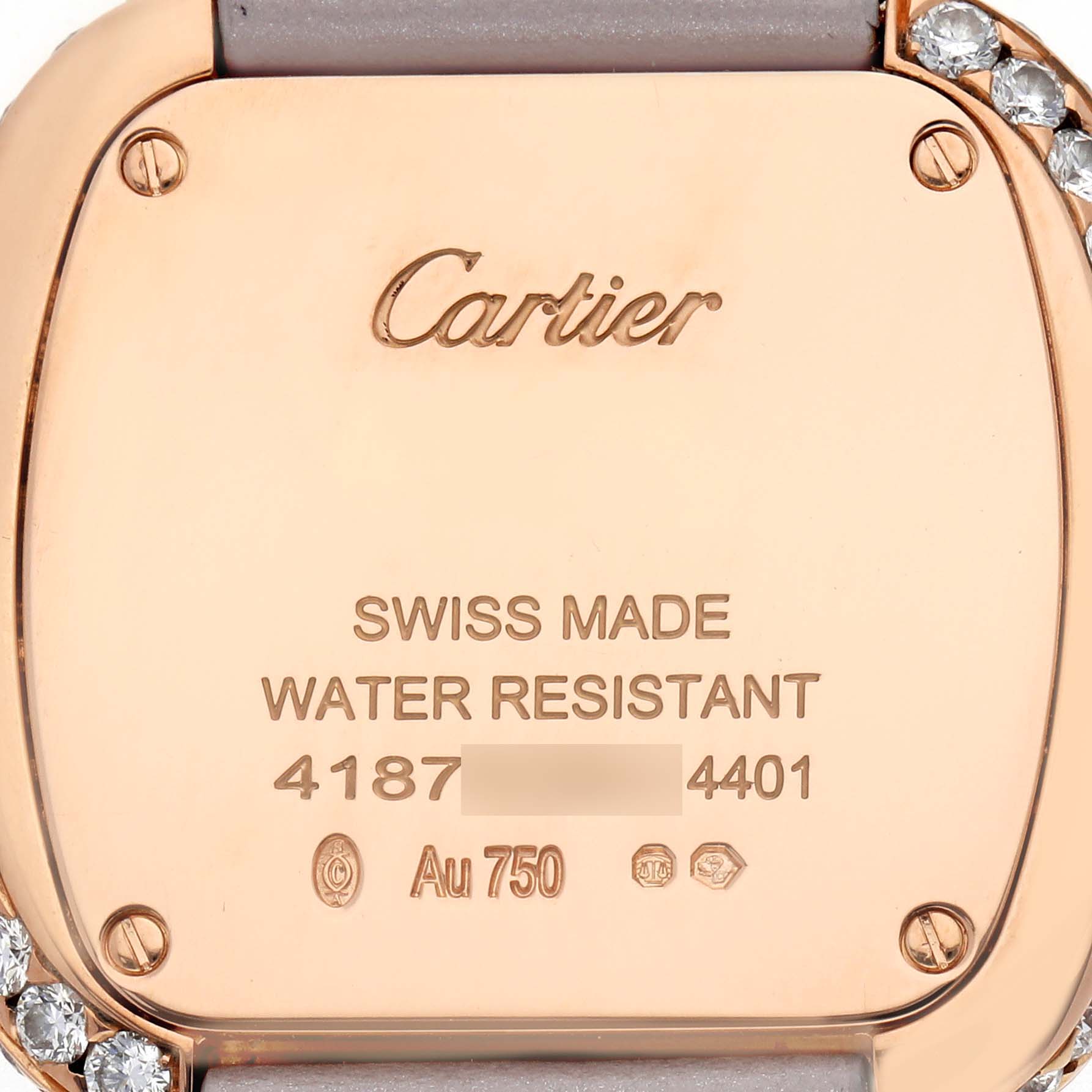 The image shows the back case of the Cartier Coussin WJCS0005 Women
s Rose Gold Silver Dial watch, highlighting the brand and specifications.