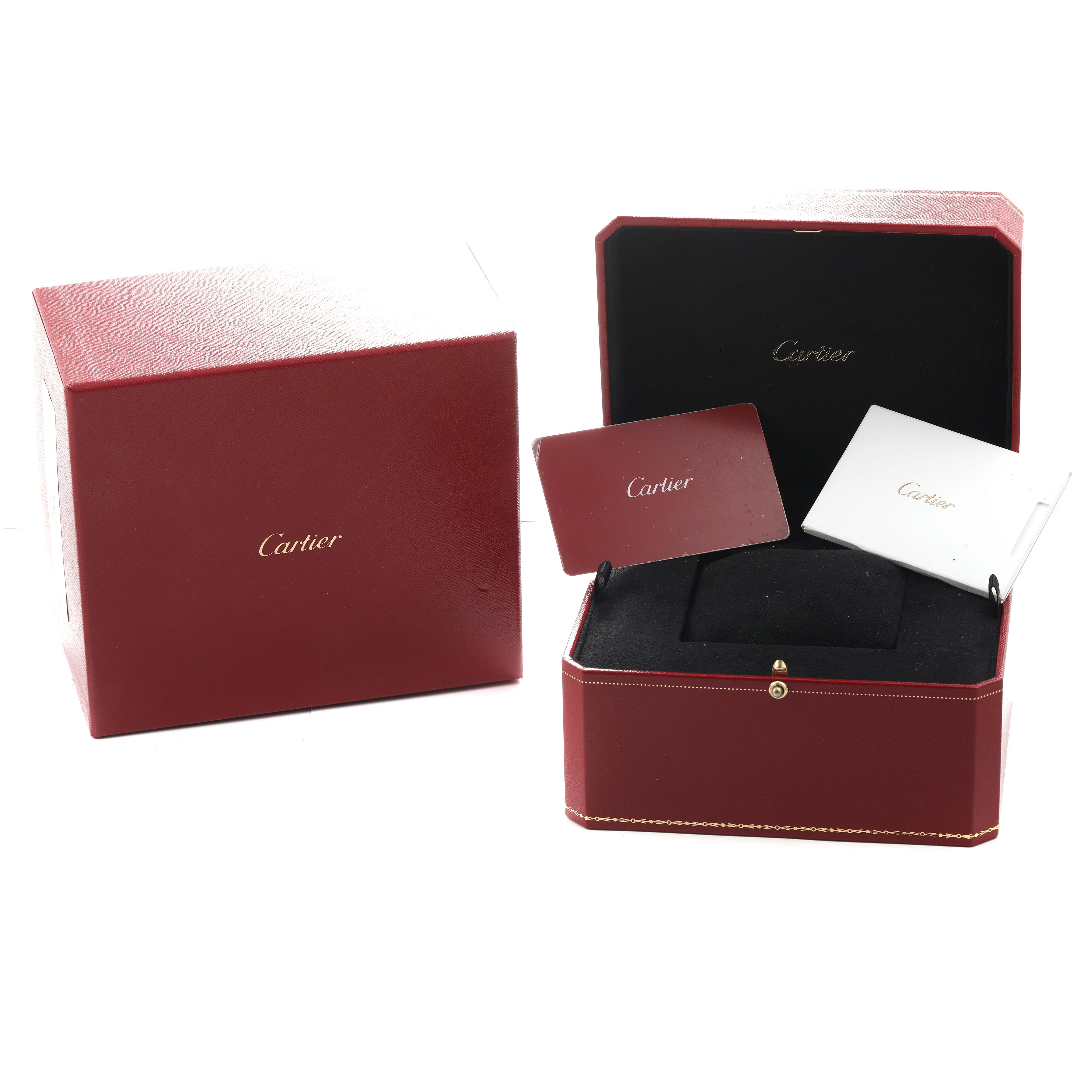 The image shows the packaging and accessories for a Cartier Coussin WJCS0005 Women
s Rose Gold Silver Dial watch, including an open box and documents.