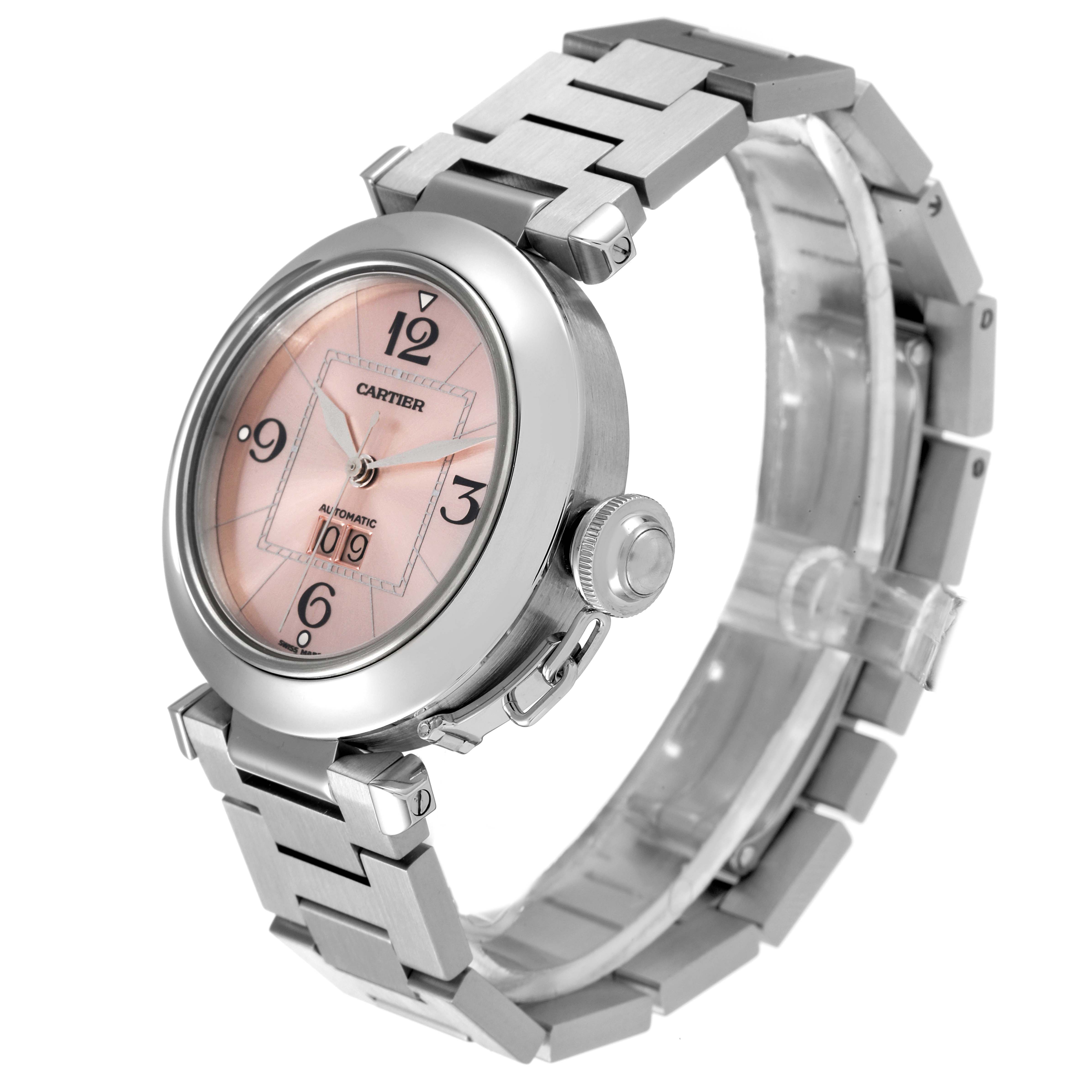 The image shows a Cartier Pasha W31058M7 Women's Stainless Steel Pink Dial W31058M7 Women's Stainless Steel Pink Dial watch from a three-quarter side angle, highlighting its face, bezel, crown, and bracelet.