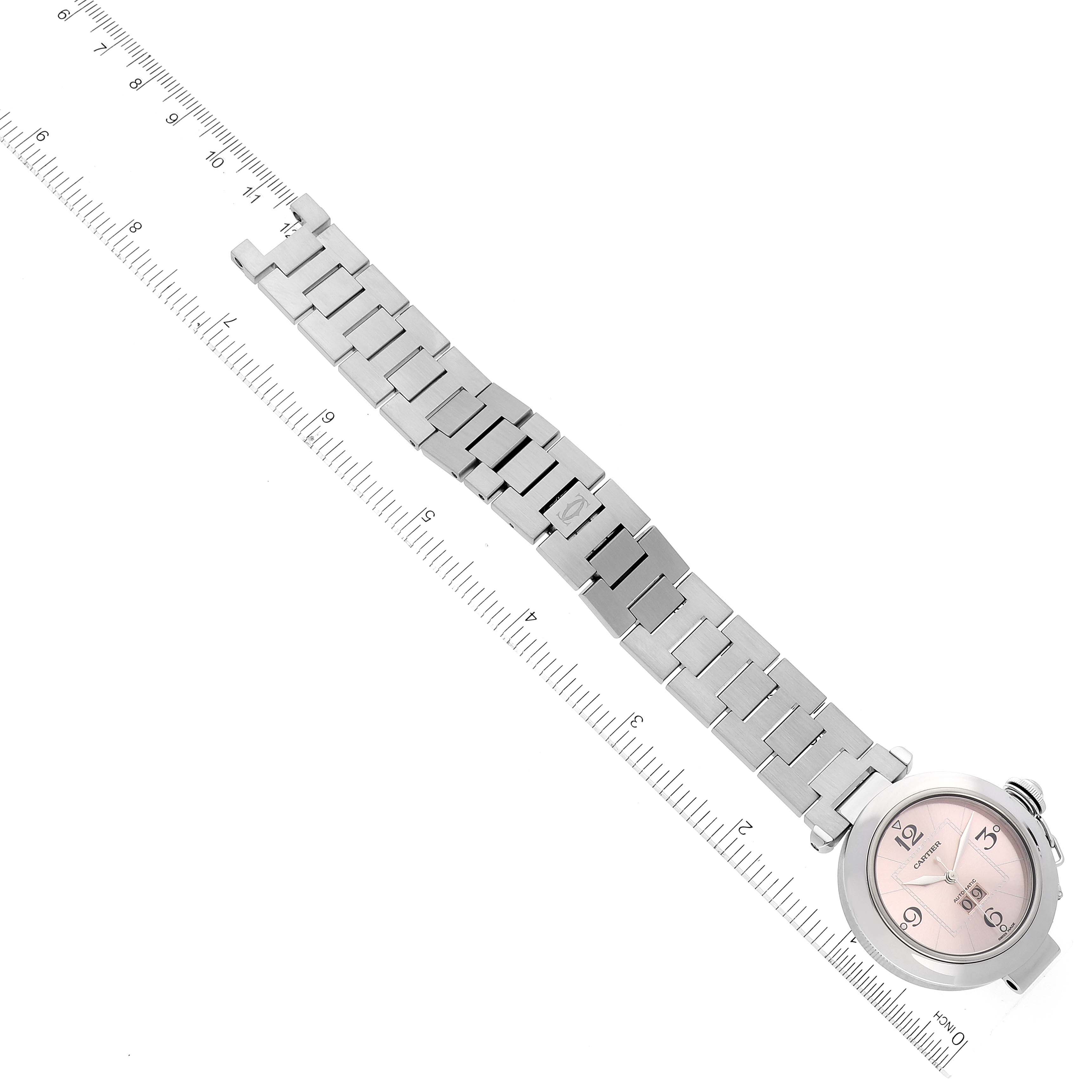 The image shows a Cartier Pasha W31058M7 Women's Stainless Steel Pink Dial W31058M7 Women's Stainless Steel Pink Dial watch laid flat with its metal bracelet fully extended, measured against a ruler.
