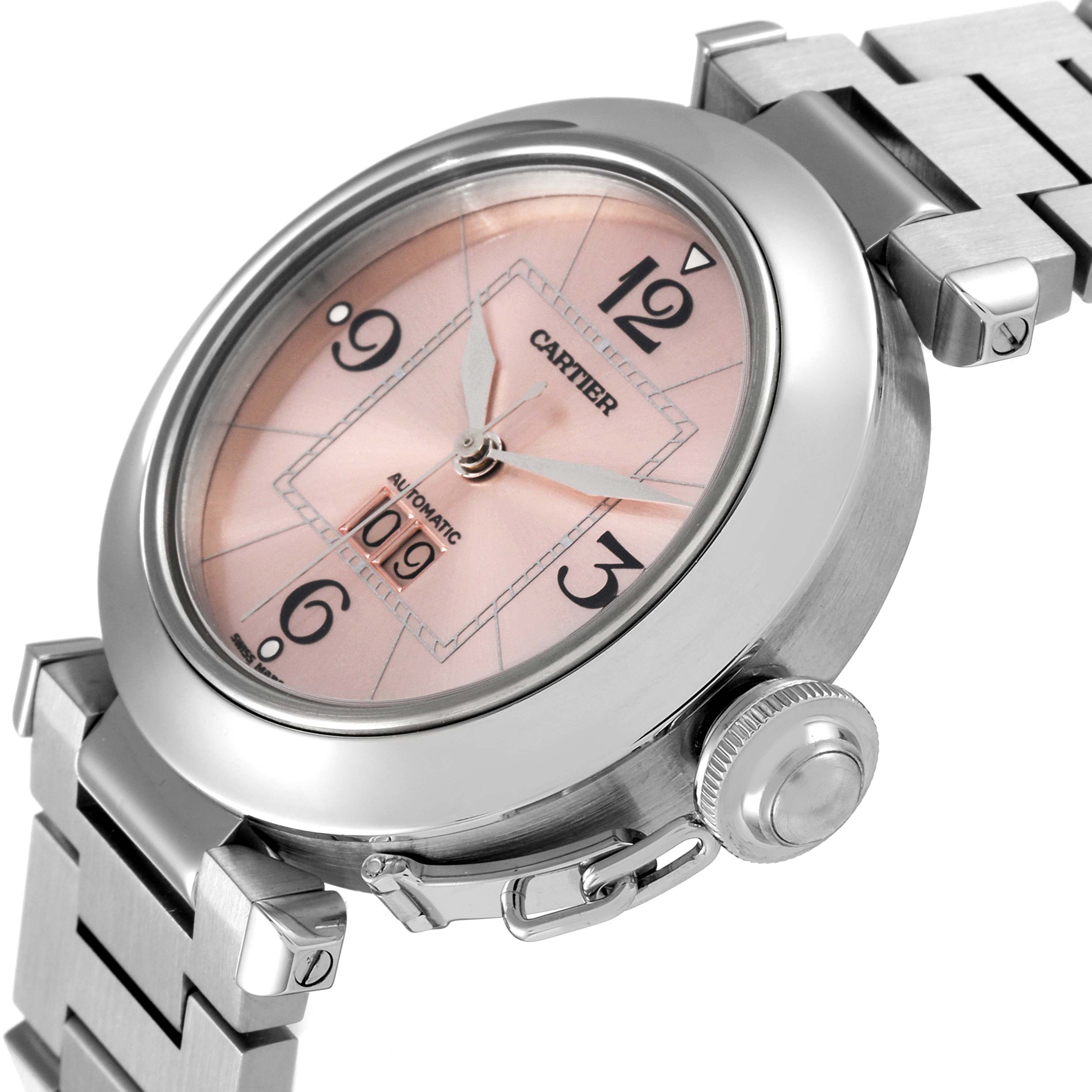 This image shows a close-up view of a Cartier Pasha W31058M7 Women's Stainless Steel Pink Dial W31058M7 Women's Stainless Steel Pink Dial watch, highlighting its pink dial, bezel, crown, and stainless steel bracelet.