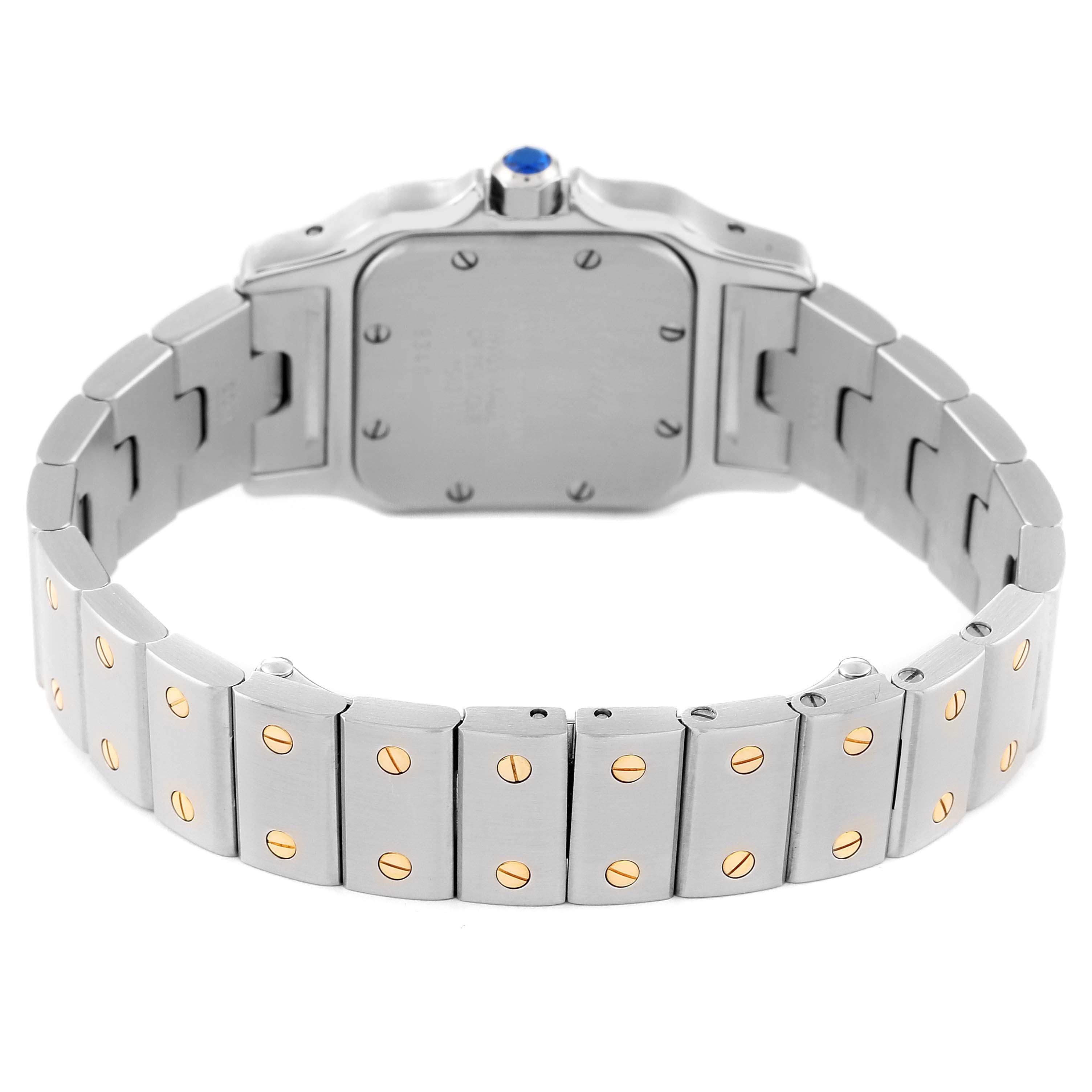This image shows the back view of a Santos model by Cartier, highlighting the bracelet and case back with gold screws.