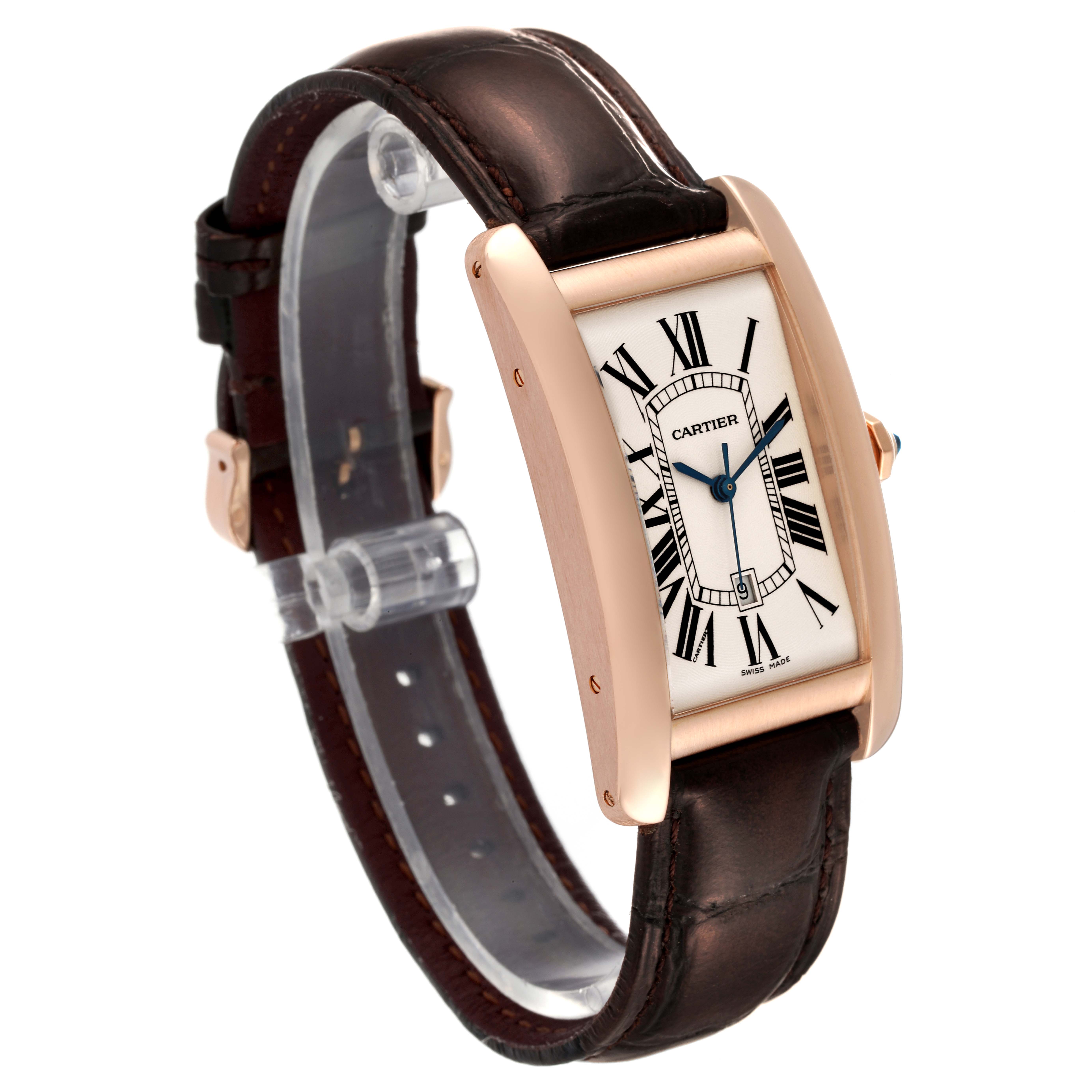 The Tank Americaine Cartier watch is shown at a three-quarter angle, displaying its face, strap, and case.