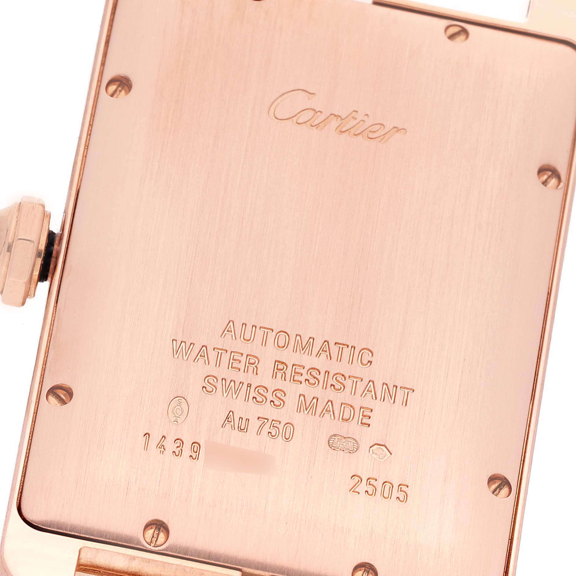 This is an image of the back of a Cartier Tank Americaine W2609156 Men
s Rose Gold Silver Dial W2609156 Men
s Rose Gold Silver Dial watch showing its engraving and specifications.