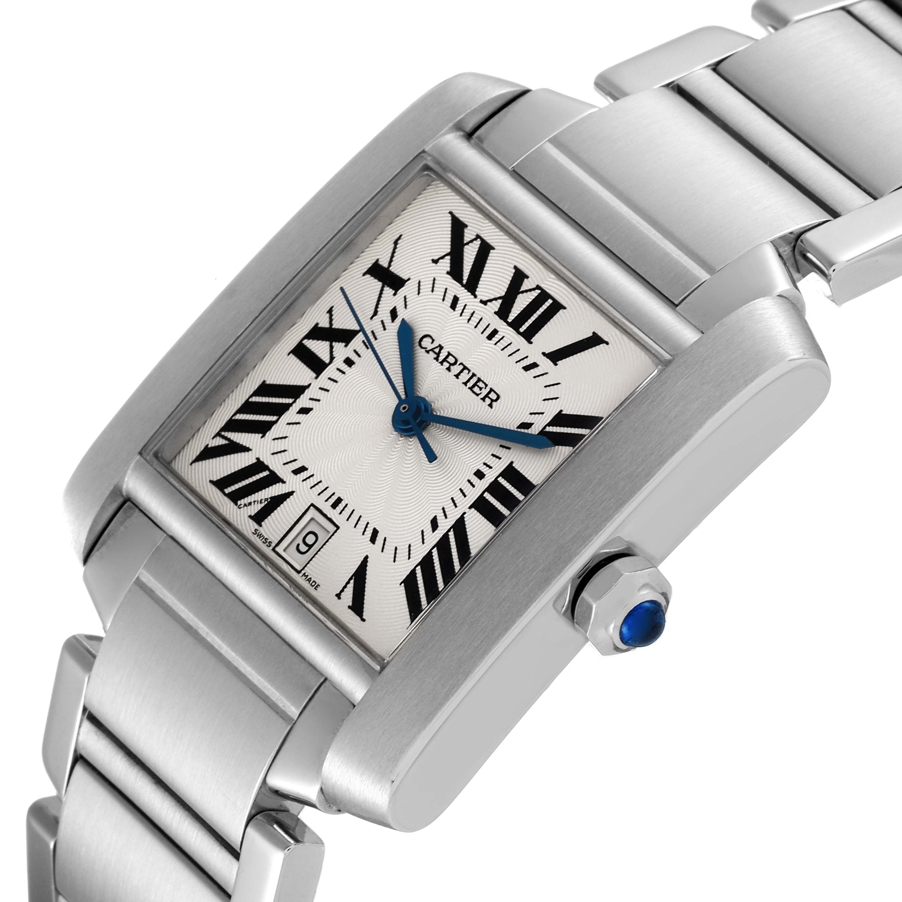 The Cartier Tank Française watch is shown from an angle highlighting its face and part of the metal bracelet.