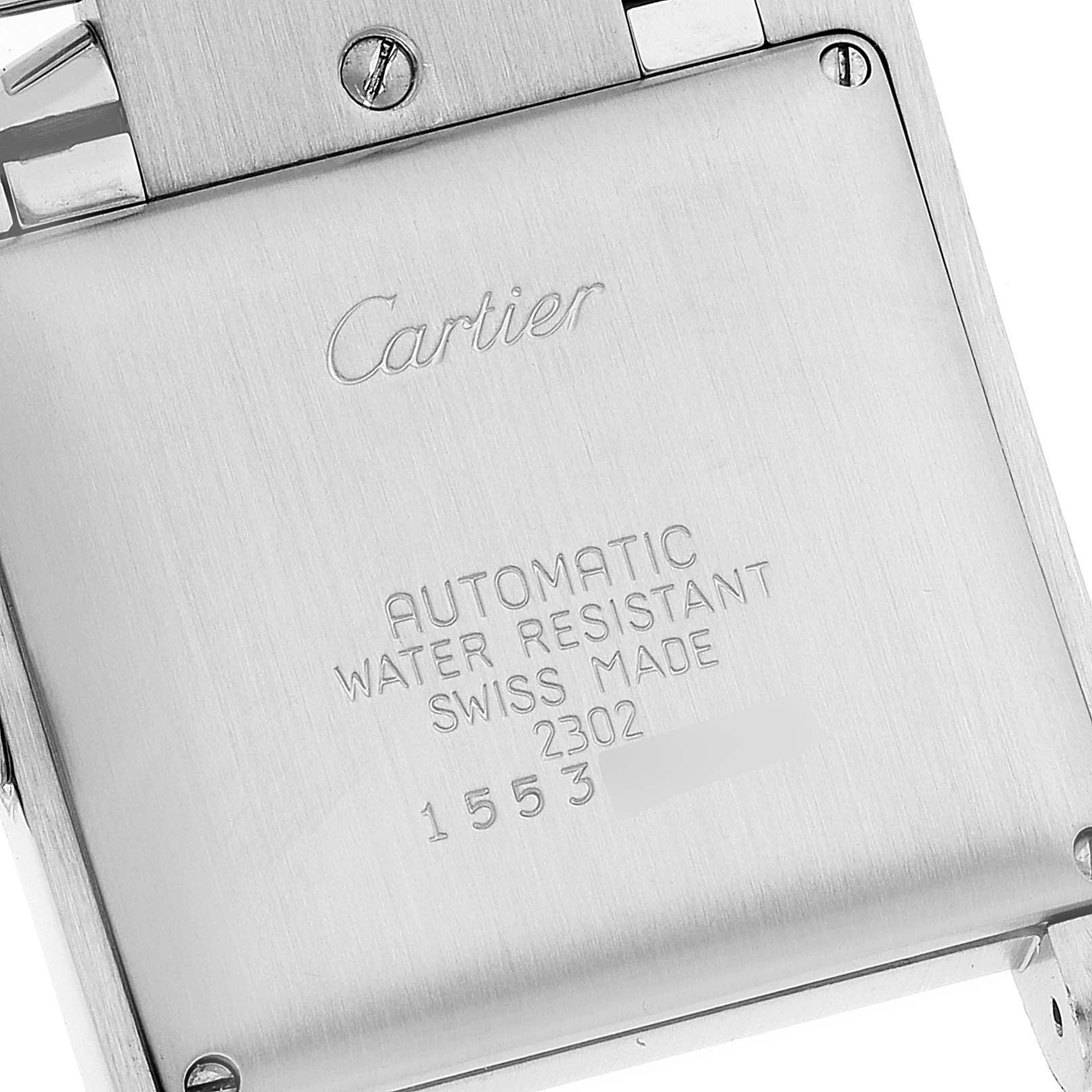 The image shows the back case of a Cartier Tank Française watch, detailing its automatic movement, water resistance, and Swiss origin.
