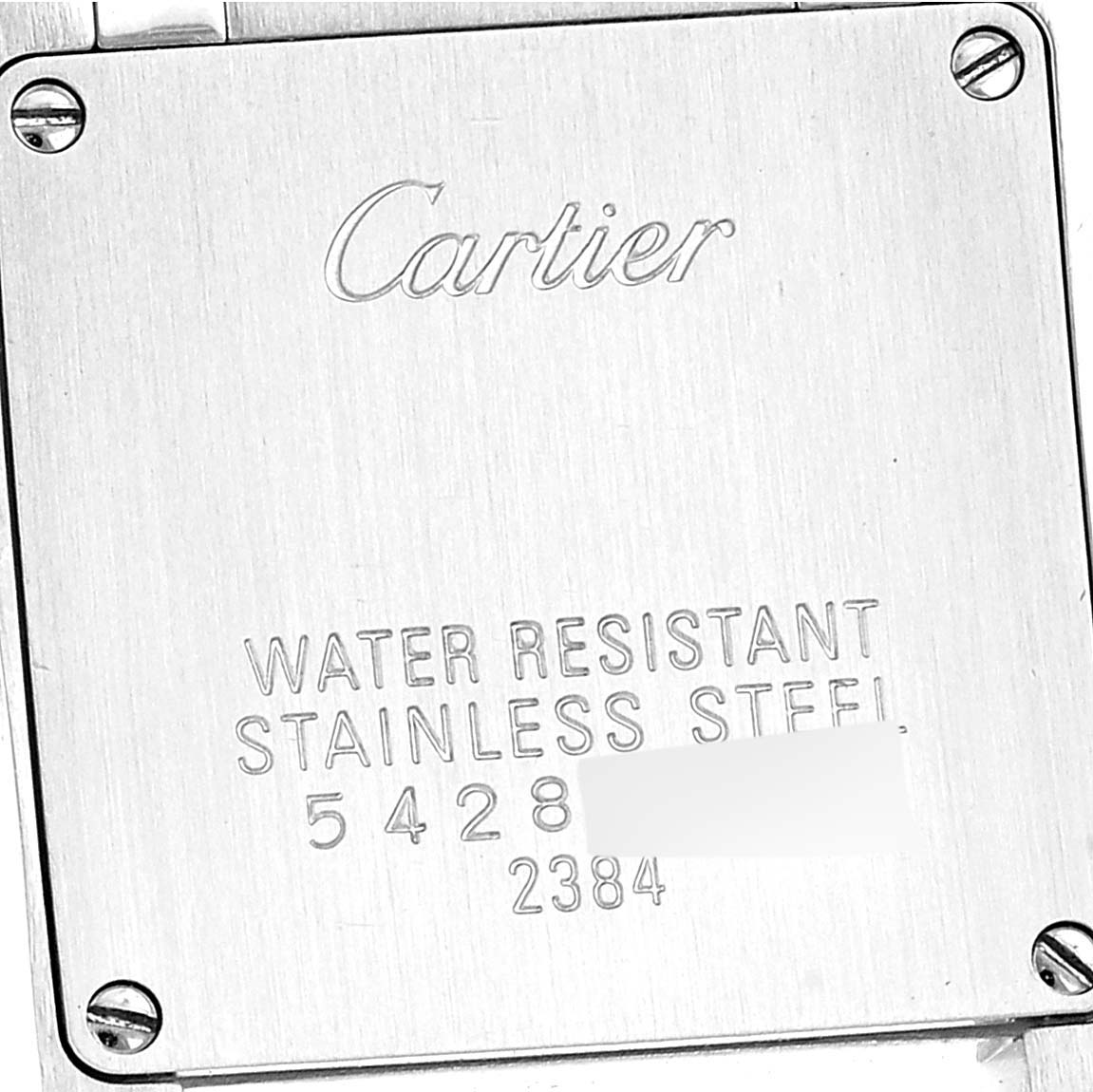 The image shows the back case of a Cartier Tank Francaise W51007Q4 Women's Steel and Gold (two tone) Silver Dial W51007Q4 Women's Steel and Gold (two tone) Silver Dial watch, engraved with brand details and specifications.