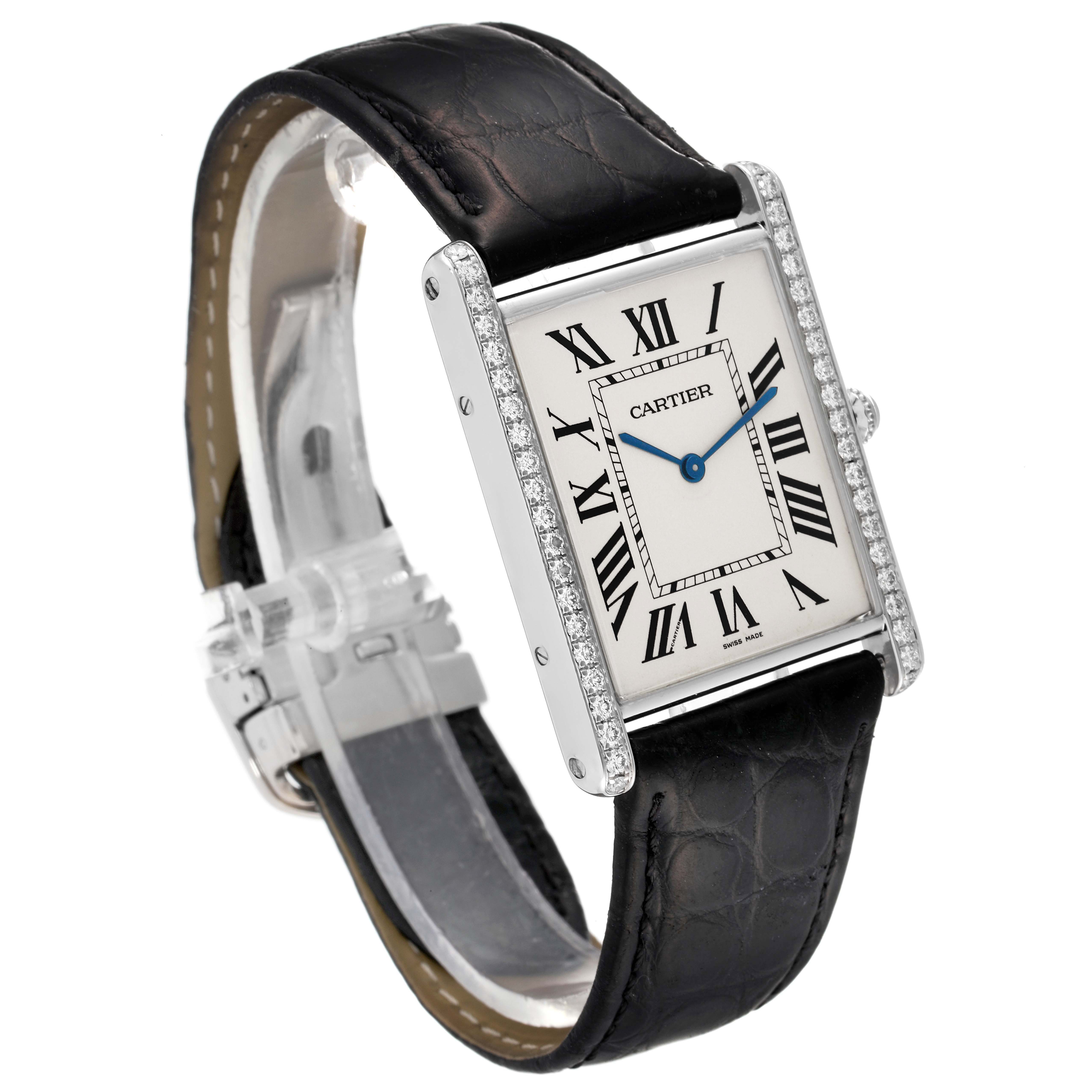 The Tank Louis Cartier watch is shown at a three-quarter angle, highlighting its rectangular case, leather strap, and Roman numeral dial.
