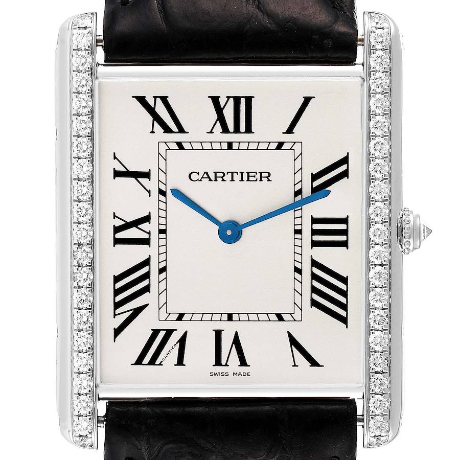 The Cartier Tank Louis WT200006 Men's White Gold Silver Dial watch is shown from the front, highlighting its rectangular face, diamond-accented sides, and blue hands.