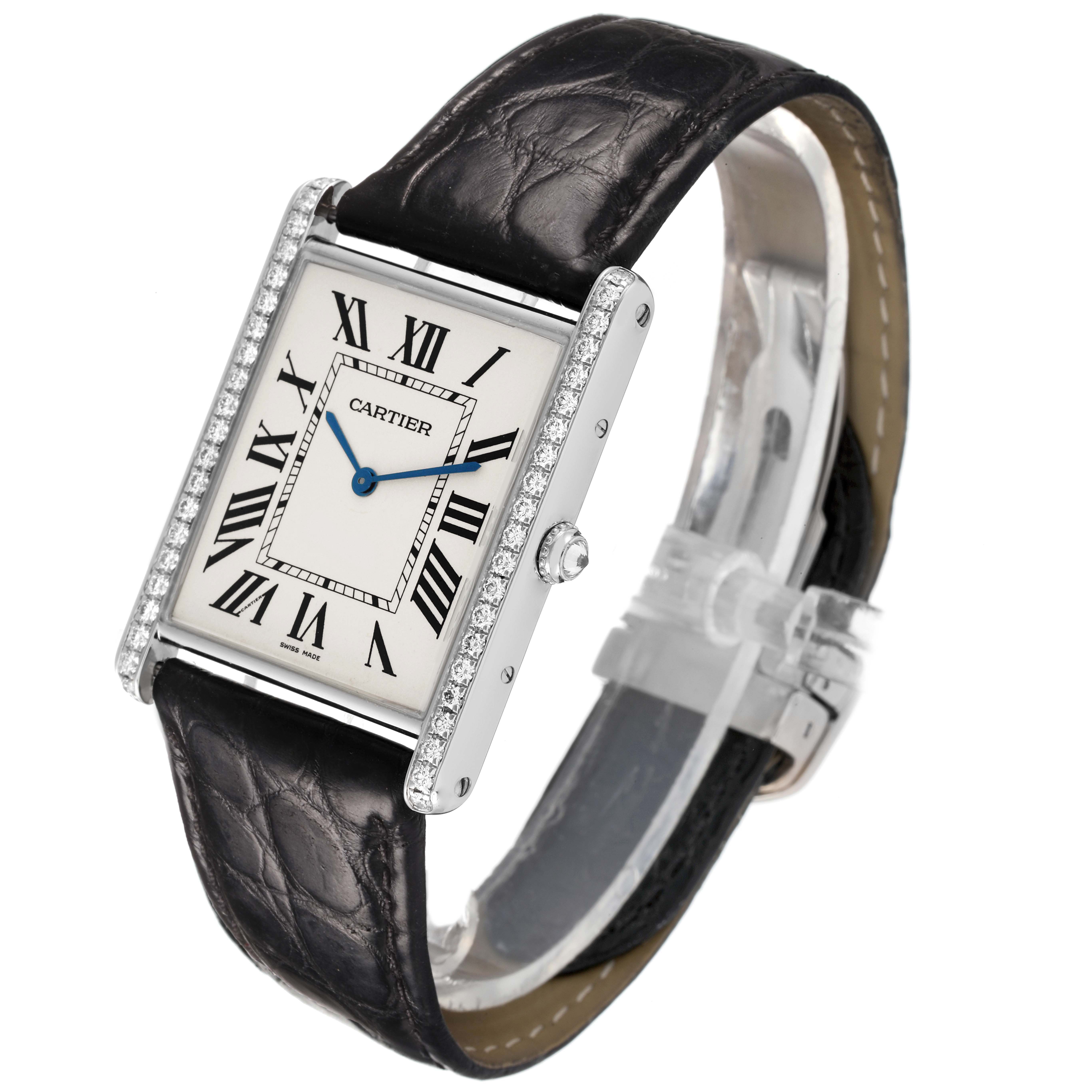 The Cartier Tank Louis WT200006 Men's White Gold Silver Dial watch is shown at a slight angle, highlighting its rectangular face, Roman numerals, diamond bezel, and leather strap.