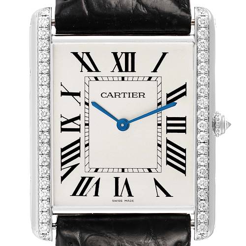 The Cartier Tank Louis WT200006 Men's White Gold Silver Dial watch is shown from the front, displaying the dial, Roman numerals, blue hands, and diamond-set bezel.