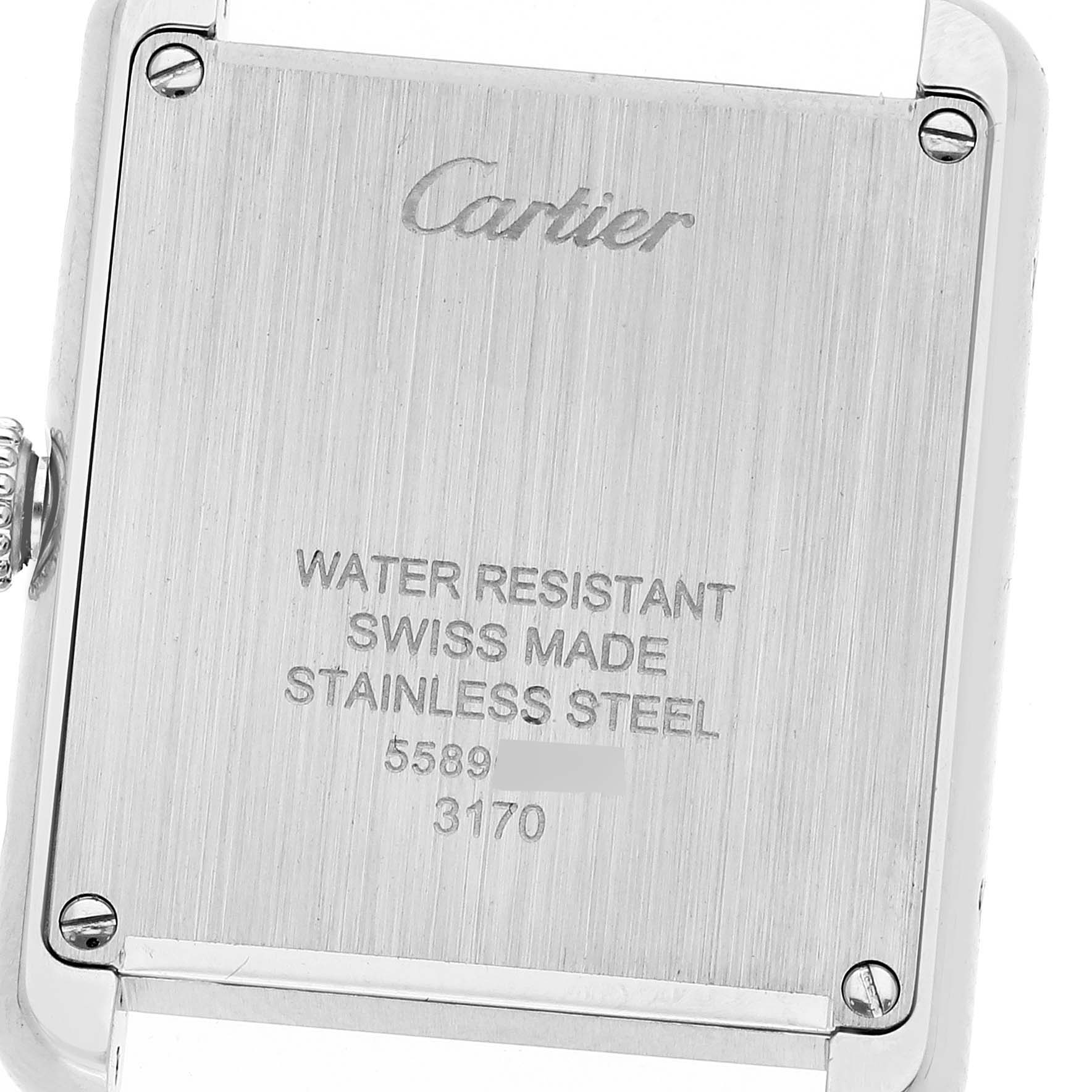 The image shows the back side of a Cartier Tank Solo W1018255 Women
s Stainless Steel Silver Dial W1018255 Women
s Stainless Steel Silver Dial watch, highlighting the brand, material, and water resistance details.