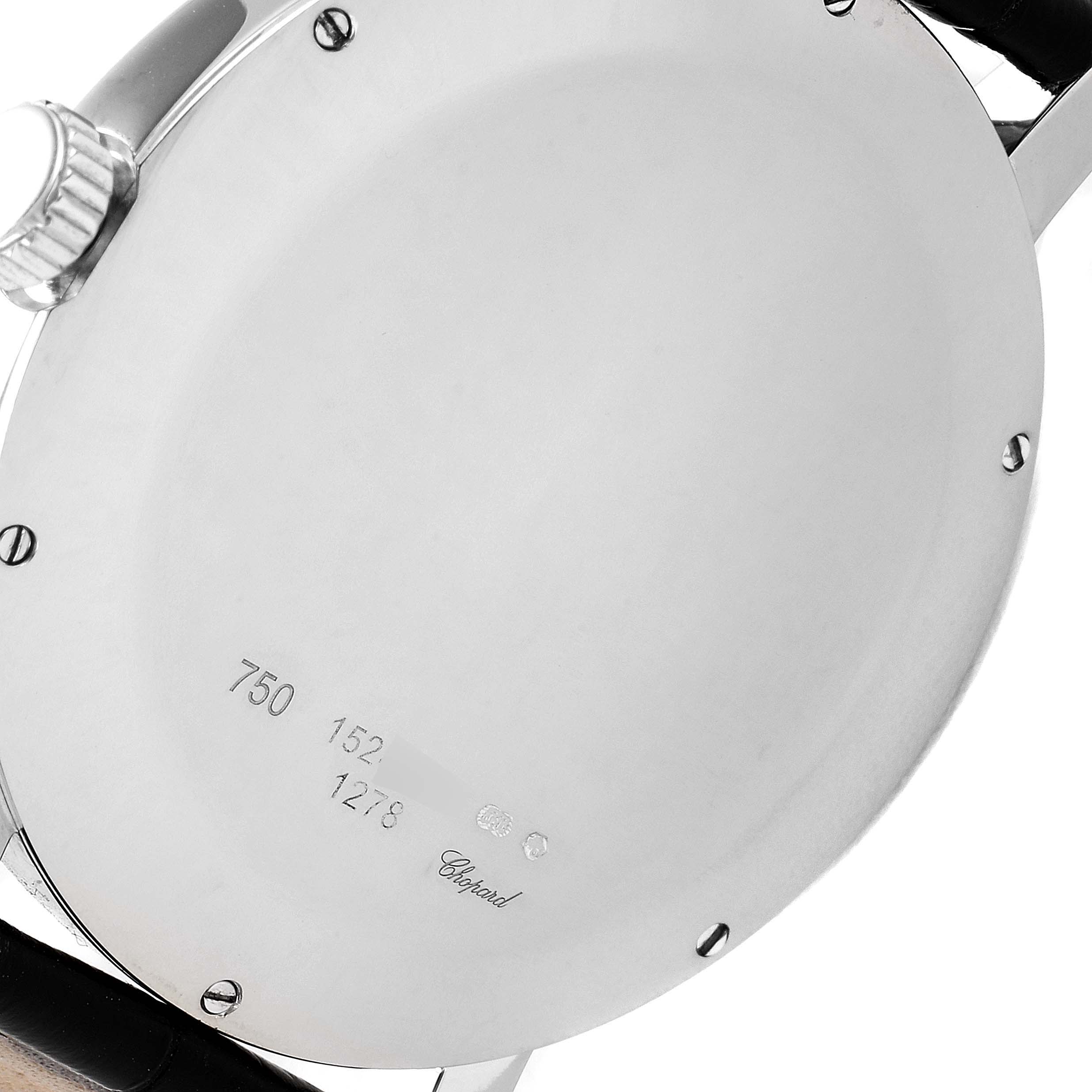 The image shows the back case and crown of a Chopard Happy Diamond 1278 Men's White Gold Black Dial 1278 Men's White Gold Black Dial watch.