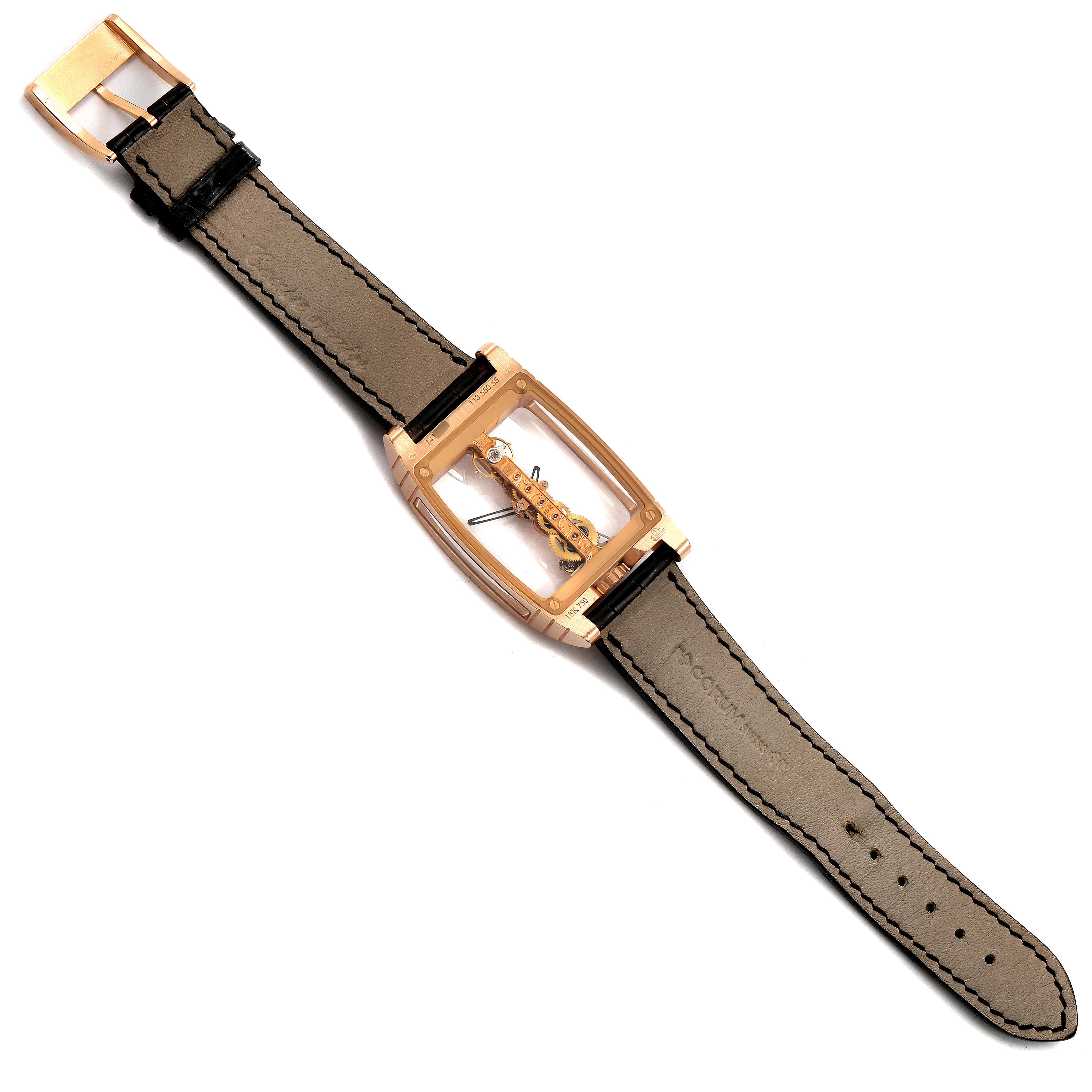 The image shows a Corum Golden Bridge B113/01043 - 113.160.55/0002 0000 Men's Rose Gold Transparent Dial B113/01043 - 113.160.55/0002 0000 Men's Rose Gold Transparent Dial watch laid flat, displaying the strap, case, buckle, and intricate internal mechanics.