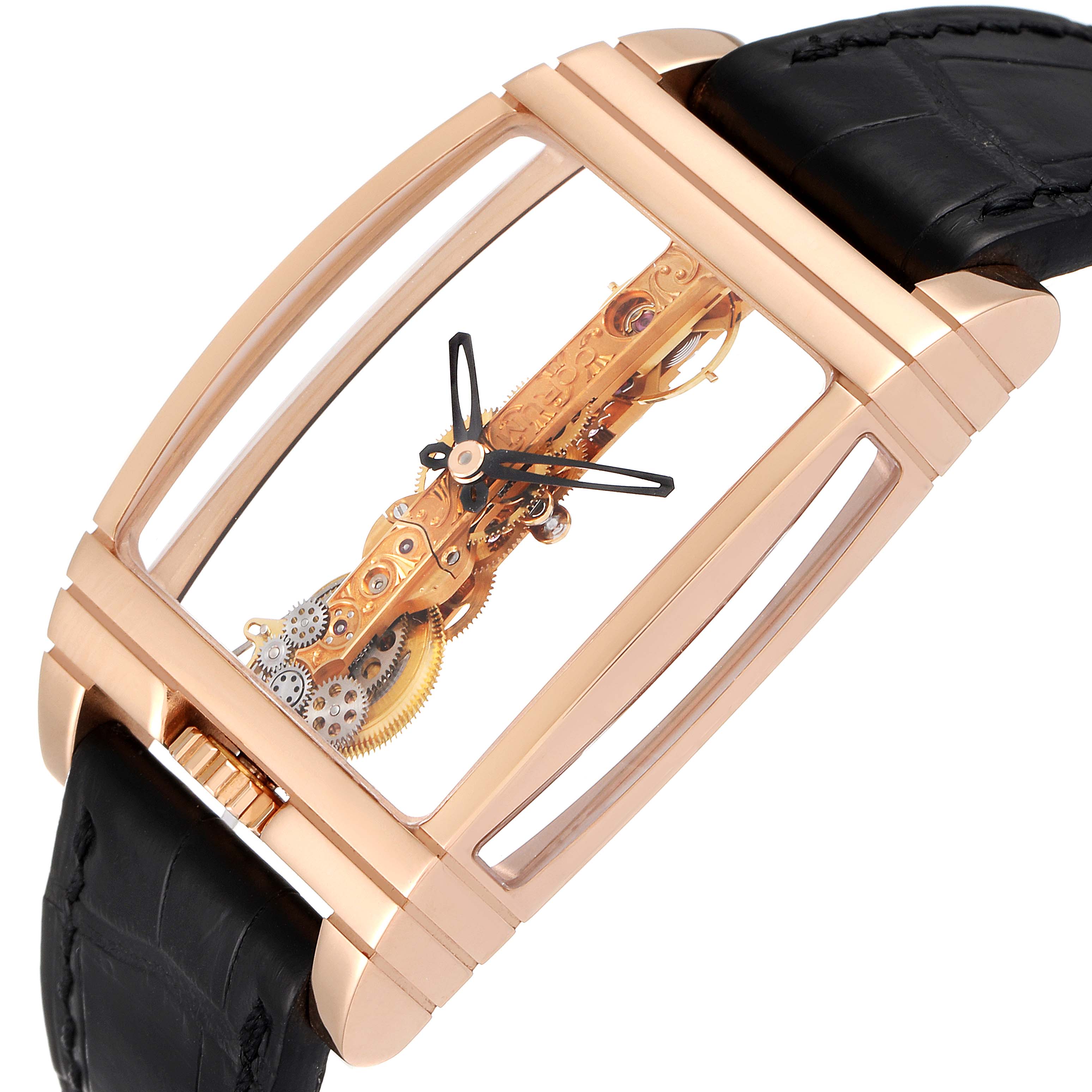 This image showcases a Corum Golden Bridge B113/01043 - 113.160.55/0002 0000 Men's Rose Gold Transparent Dial B113/01043 - 113.160.55/0002 0000 Men's Rose Gold Transparent Dial watch at a slight side angle, revealing its intricate mechanism and black leather strap.