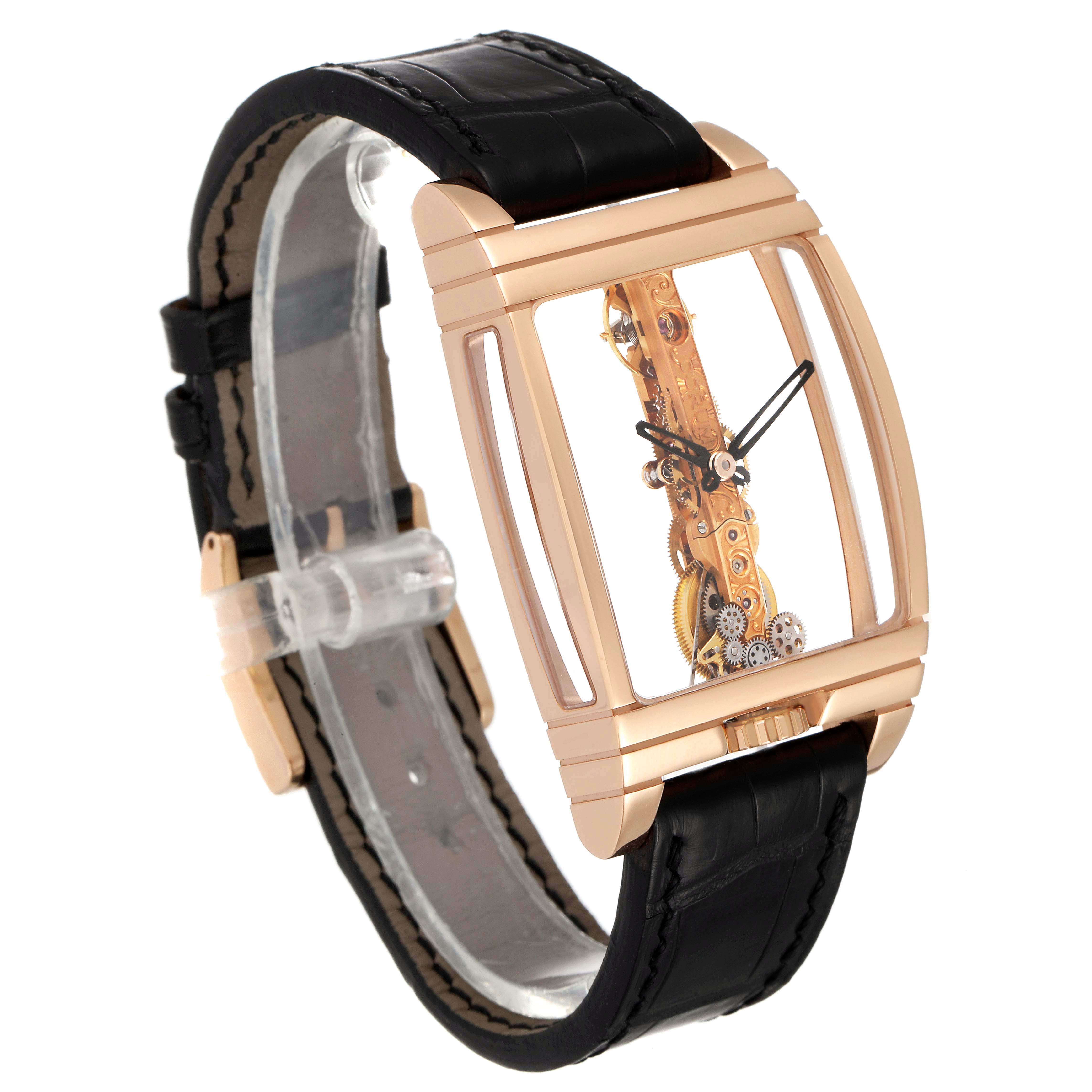 The Corum Golden Bridge B113/01043 - 113.160.55/0002 0000 Men's Rose Gold Transparent Dial model is shown at a slight angle, highlighting its transparent case and complex internal mechanics.