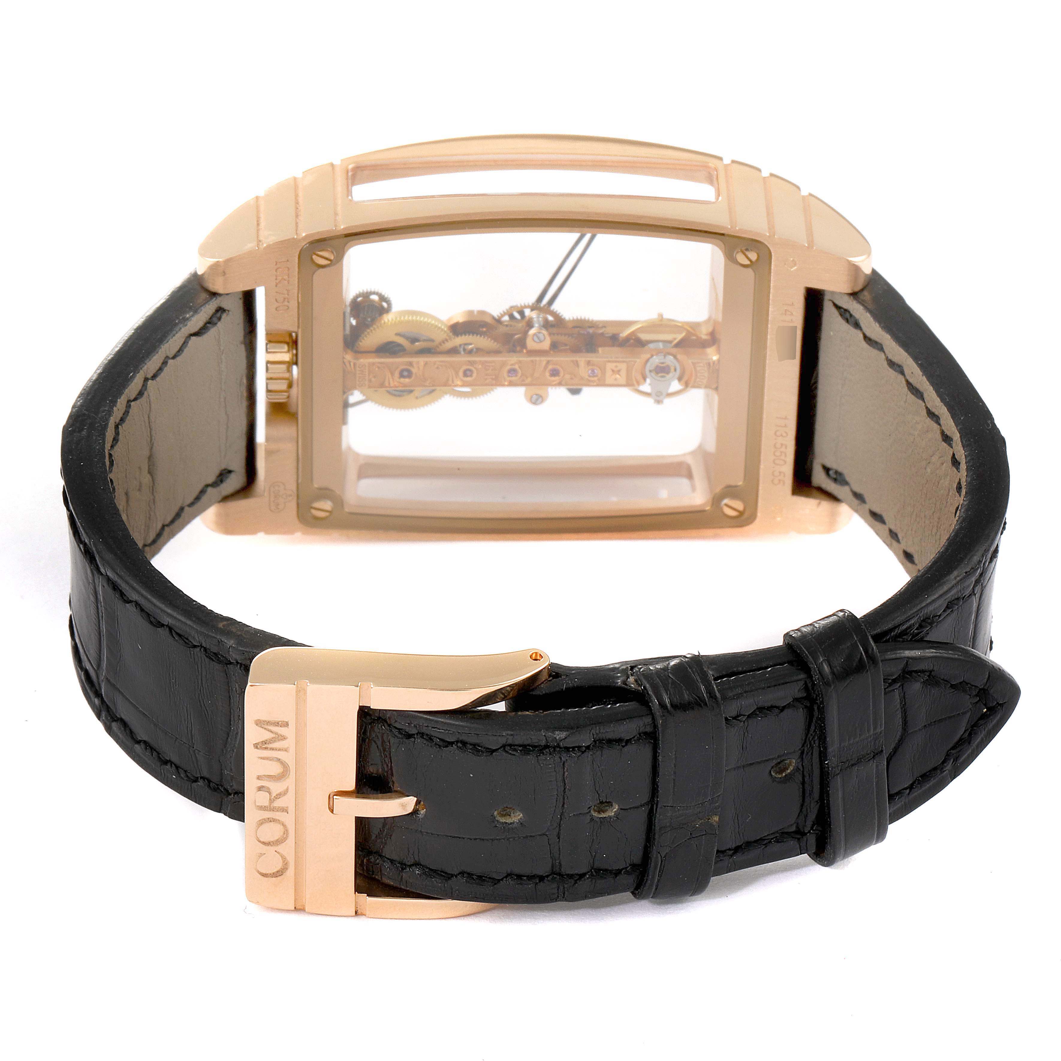 The image shows the back view of the Corum Golden Bridge B113/01043 - 113.160.55/0002 0000 Men's Rose Gold Transparent Dial watch, highlighting the transparent case and leather strap with a buckle.
