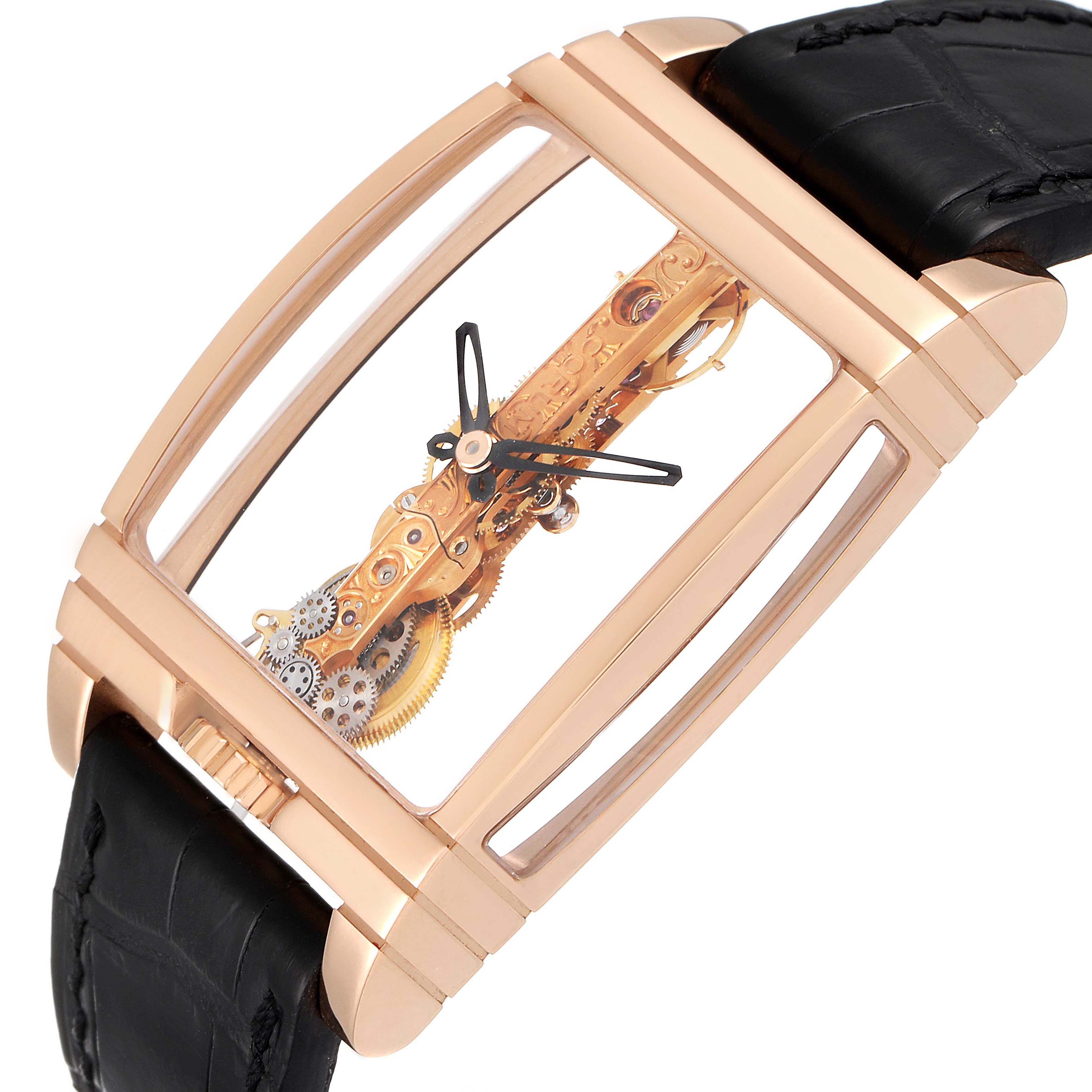 The image shows a Corum Golden Bridge B113/01043 - 113.160.55/0002 0000 Men's Rose Gold Transparent Dial watch at an angled view highlighting its intricate movement and rose gold case.