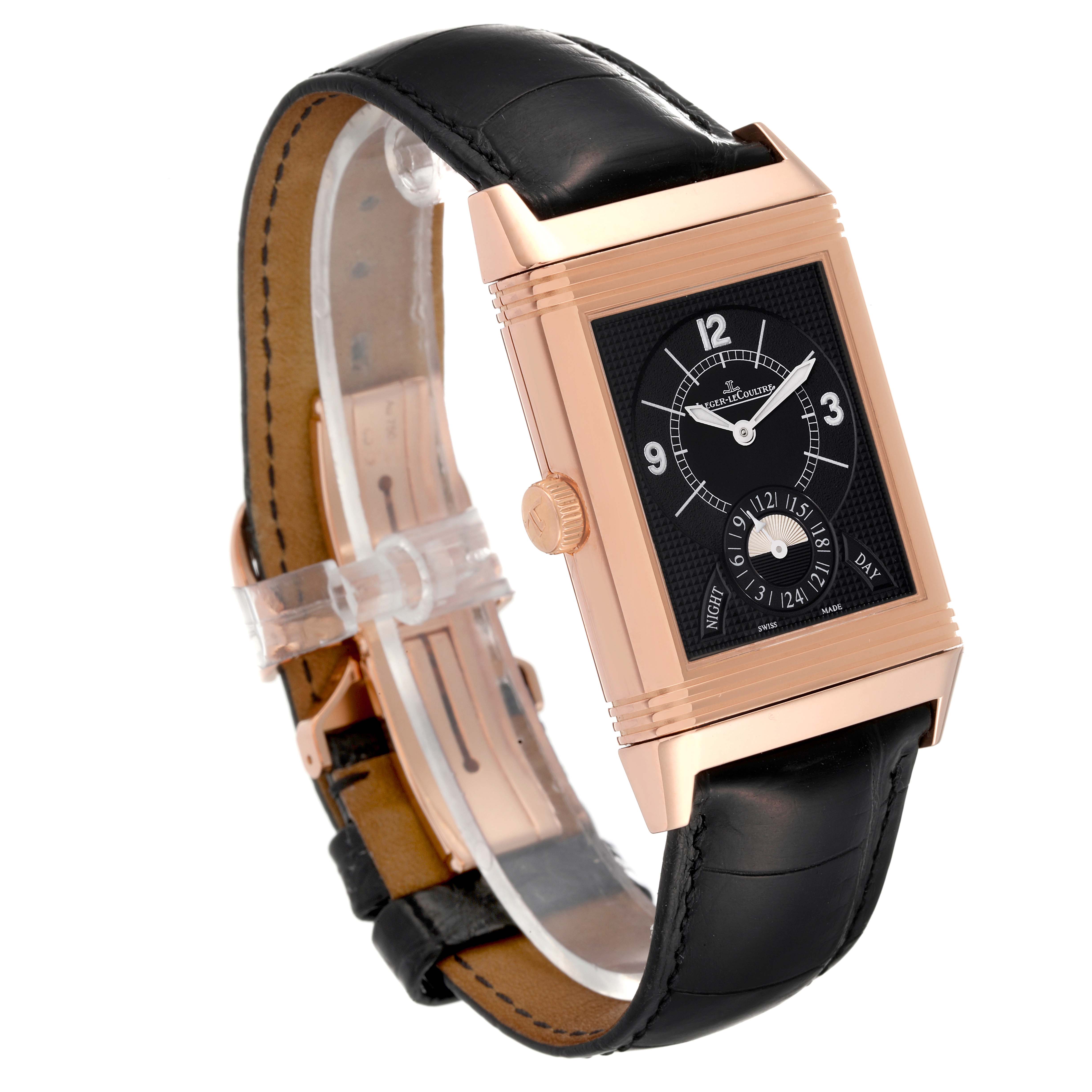 This image shows a Jaeger LeCoultre Reverso Q3742521 Men's Rose Gold Silver Dial Q3742521 Men's Rose Gold Silver Dial watch at a three-quarter angle, highlighting its rose gold case and black leather strap.