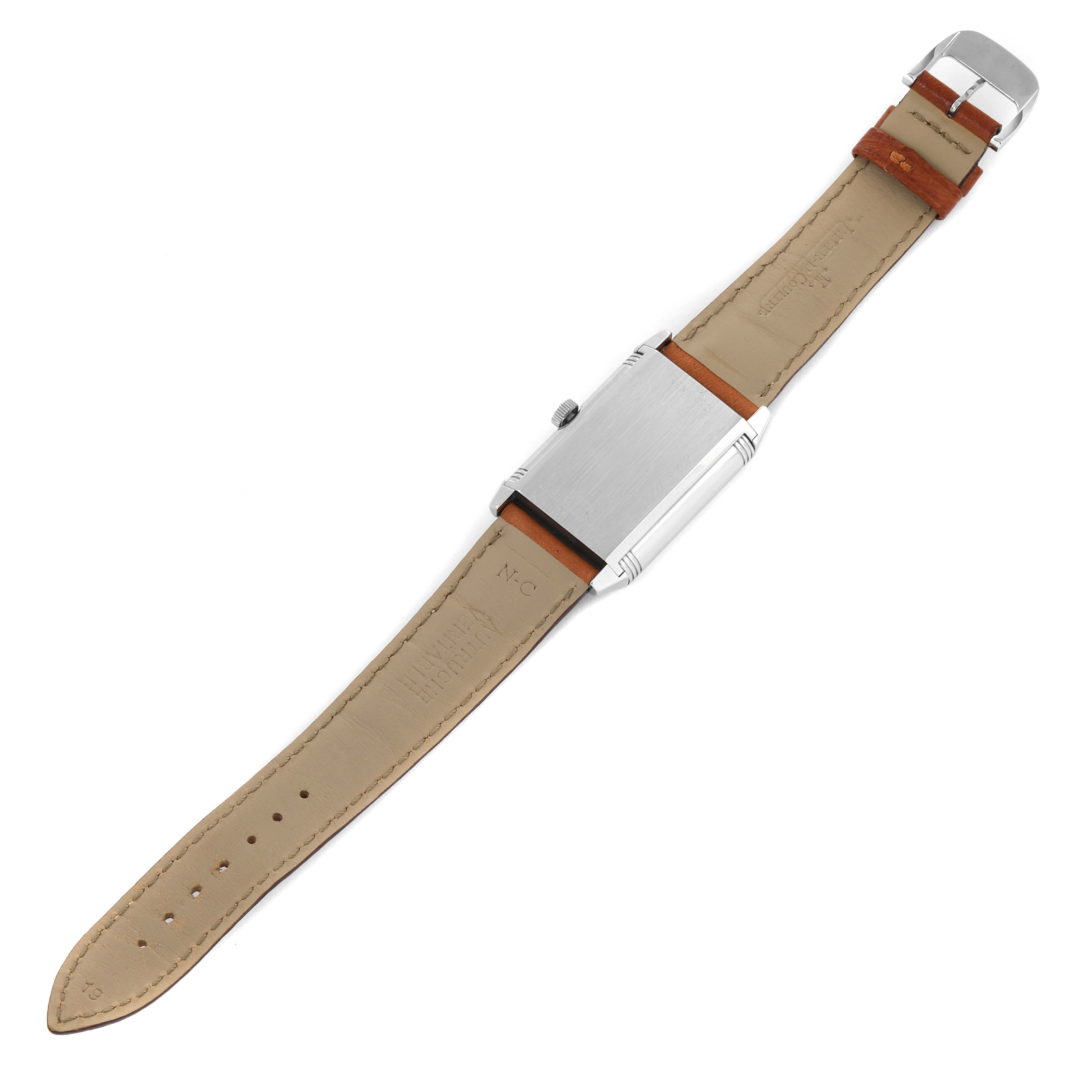 This image shows the Jaeger-LeCoultre Reverso watch from a top-down angle, highlighting its back and leather strap.