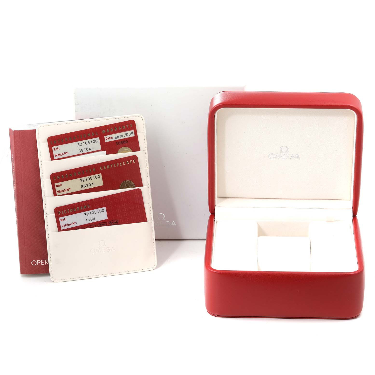 This image shows the Omega Speedmaster 3210.51.00 Men
s Stainless Steel Black Dial 3210.51.00 Men
s Stainless Steel Black Dial watch box, operating instruction book, and warranty cards.