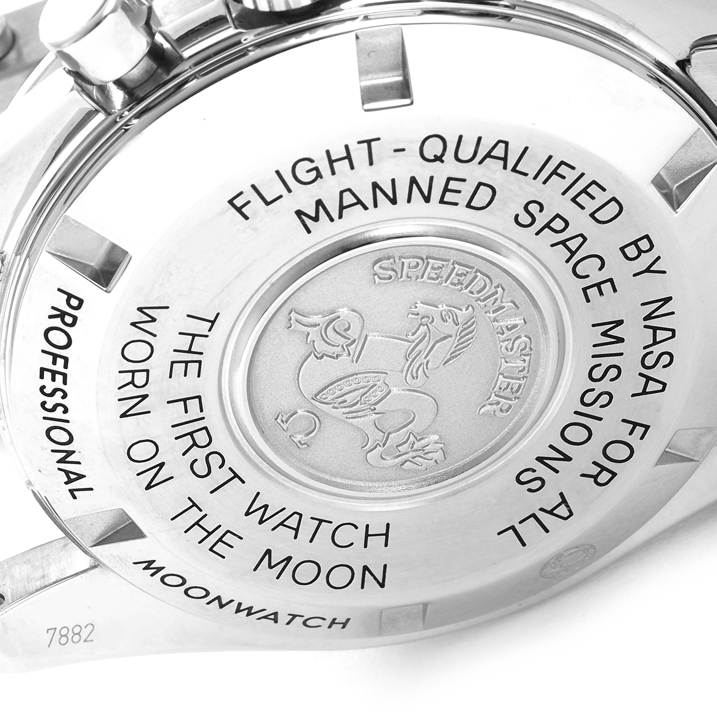 The image shows the engraved case back of the Omega Speedmaster 311.30.42.30.01.005 Men's Stainless Steel Black Dial 311.30.42.30.01.005 Men's Stainless Steel Black Dial watch with several inscriptions about its space mission heritage.