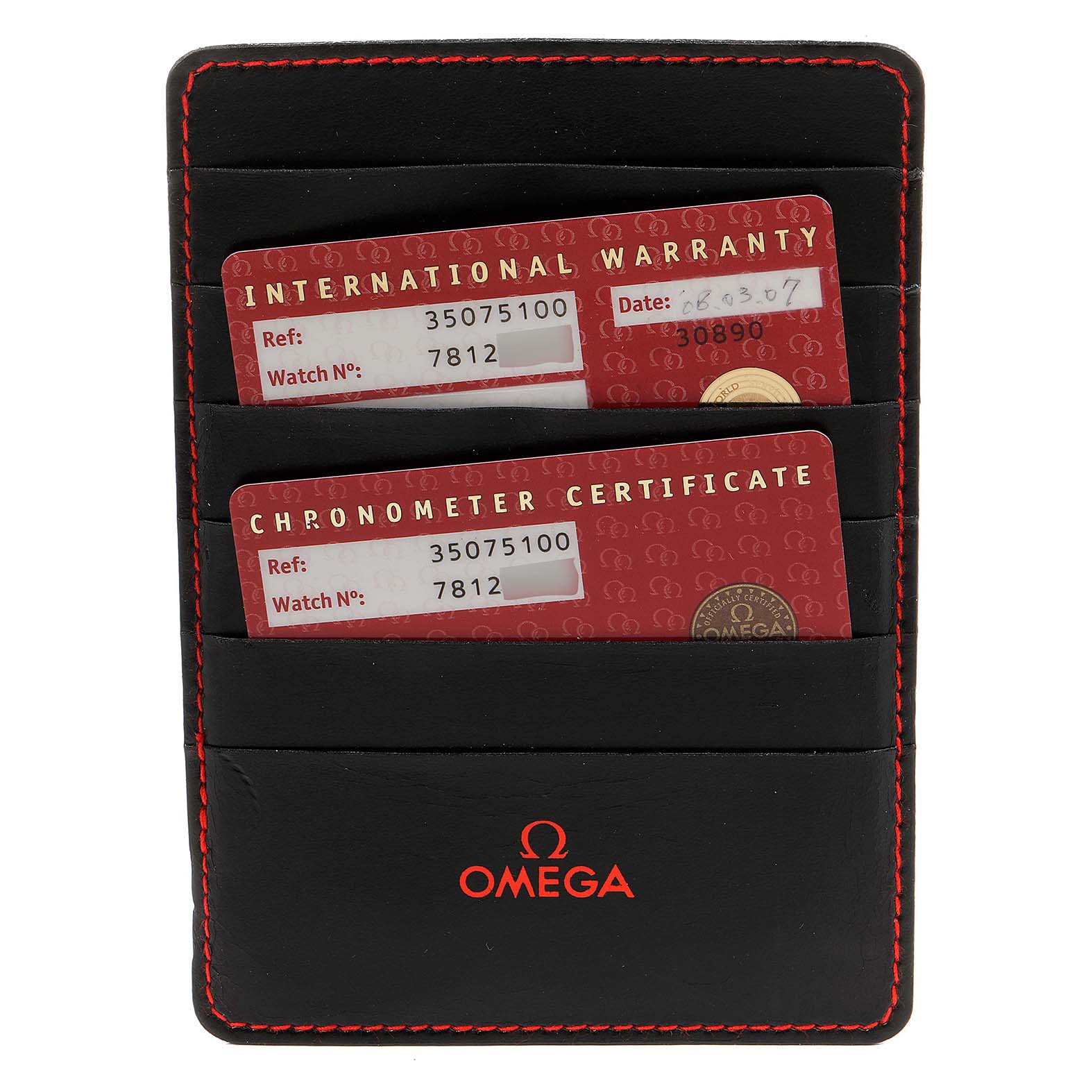 This image shows warranty and chronometer certificate cards for the Omega Speedmaster 3507.51.00 Men's Stainless Steel Black Dial 3507.51.00 Men's Stainless Steel Black Dial model in a black cardholder with red stitching.