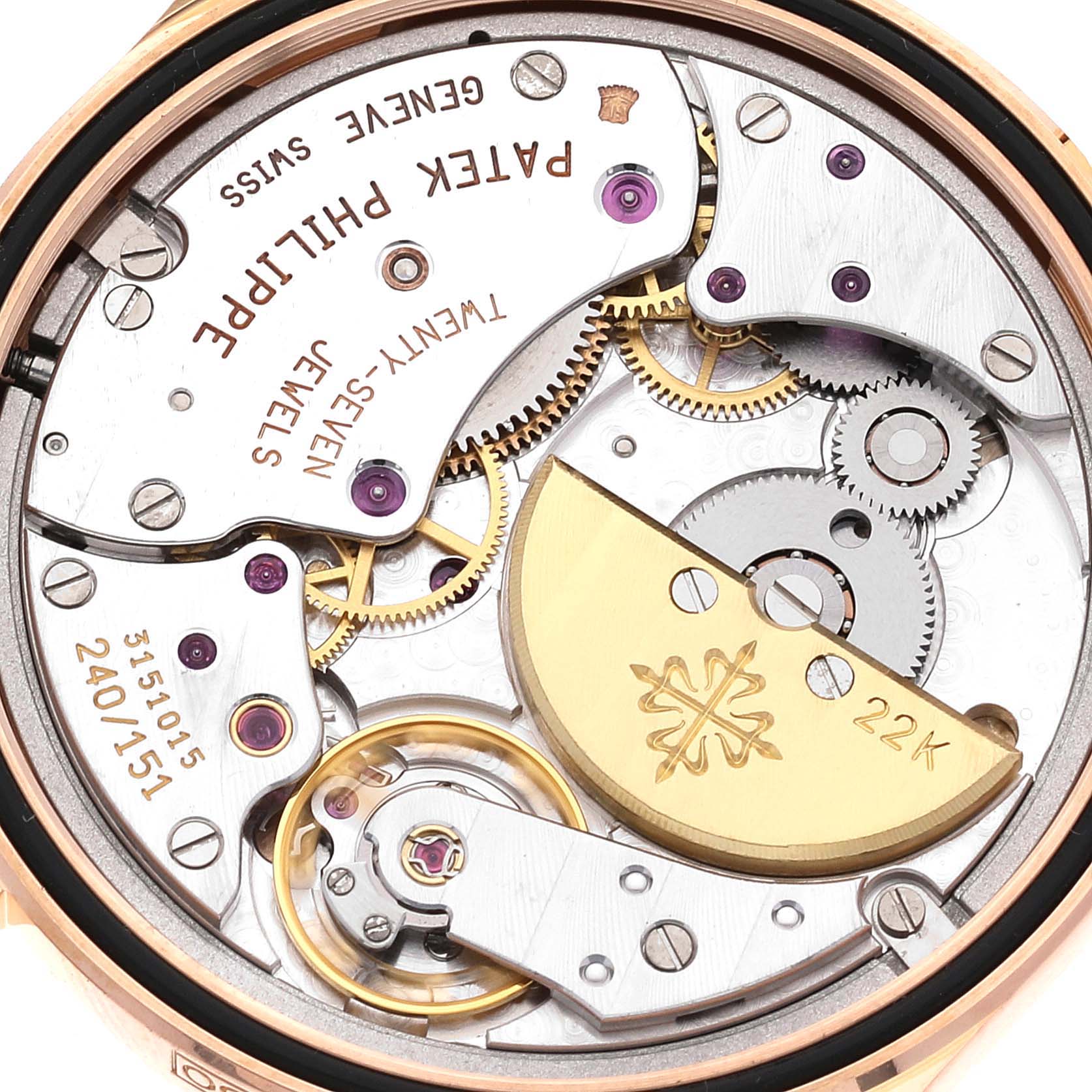 The image shows the intricate back movement mechanism of a Patek Philippe Calatrava 5000J Men's Rose Gold Brown Dial 5000J Men's Rose Gold Brown Dial's watch.