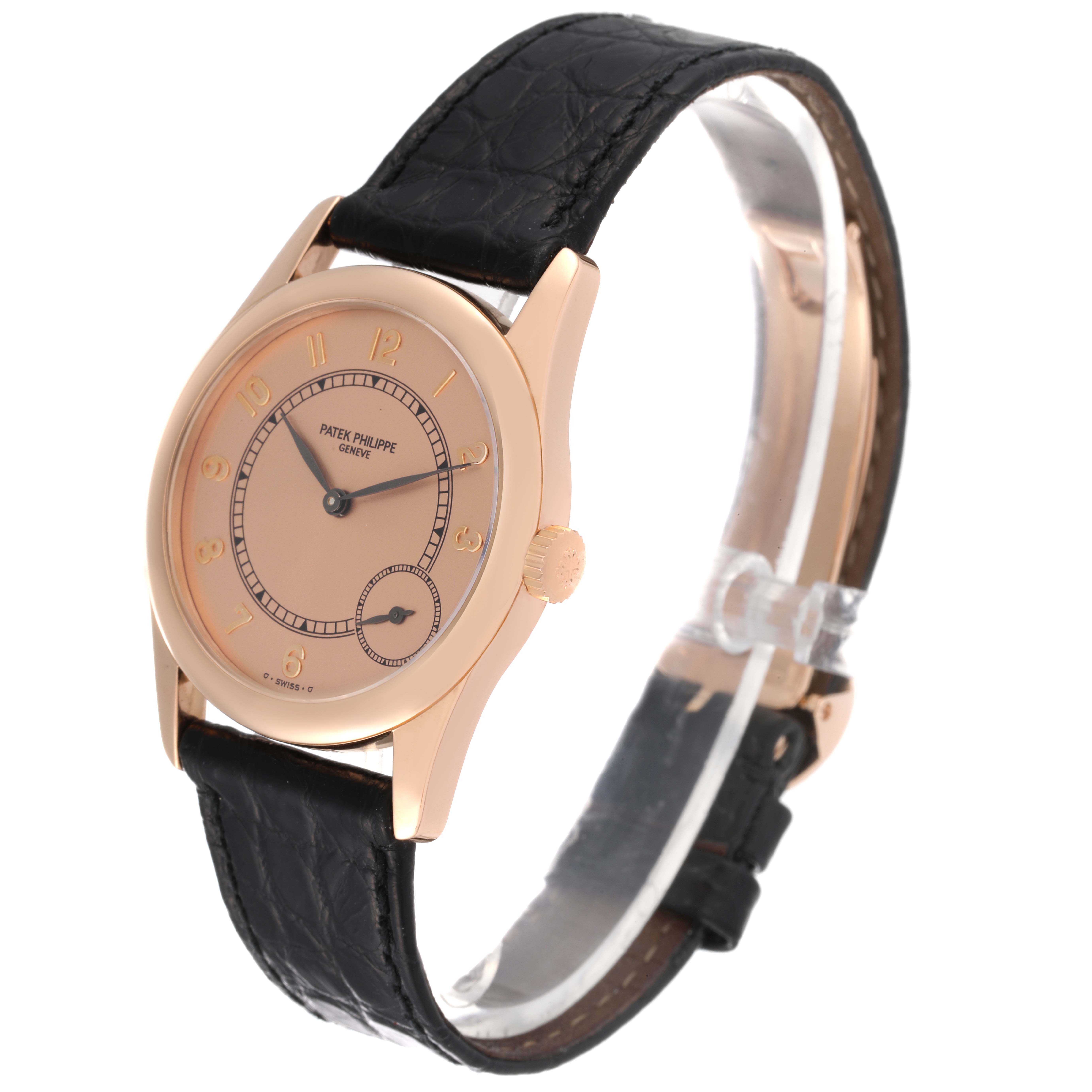 This image shows a Patek Philippe Calatrava 5000J Men's Rose Gold Brown Dial 5000J Men's Rose Gold Brown Dial watch from a front angle, highlighting its dial, case, and leather strap.