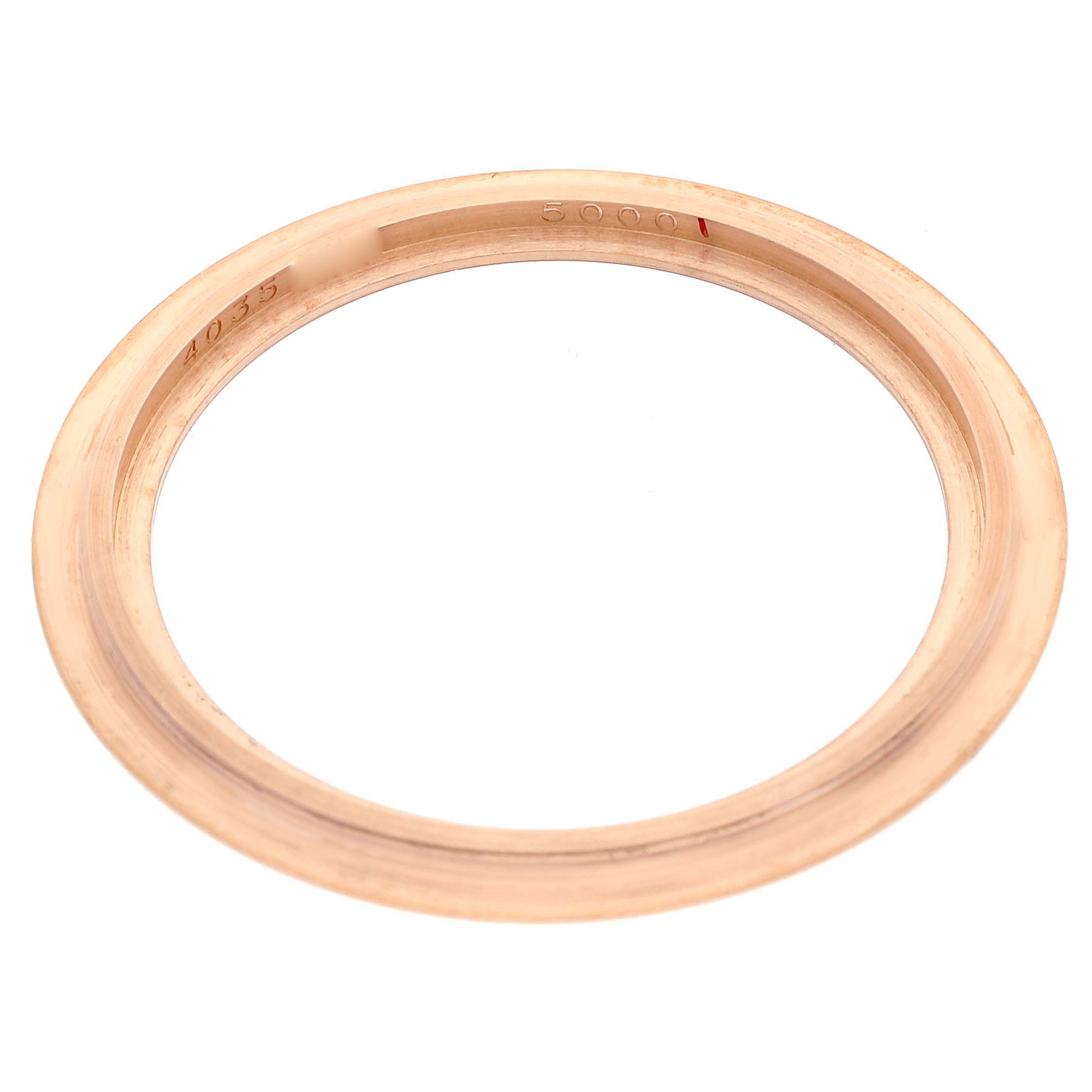 This image shows a bezel for the Calatrava model by Patek Philippe from a top-down angle.